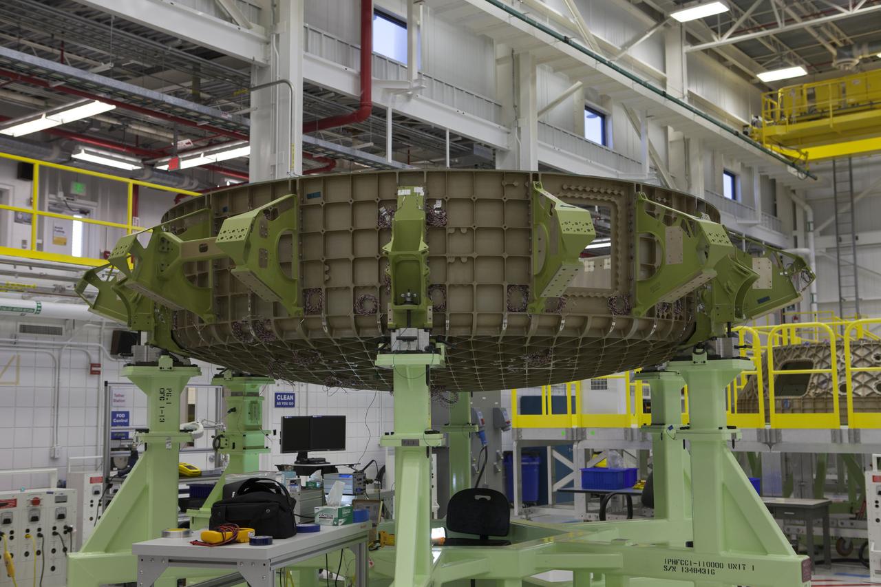 The lower dome of the Boeing CST-100 Structural Test Article awaits testing inside the Commercial Crew and Cargo Processing Facility, or C3PF, at NASA’s Kennedy Space Center in Florida. The test article will serve as a pathfinder for assembling and processing operational CST-100 spacecraft inside the revitalized facility, which for 20 years served as a shuttle processing hangar.