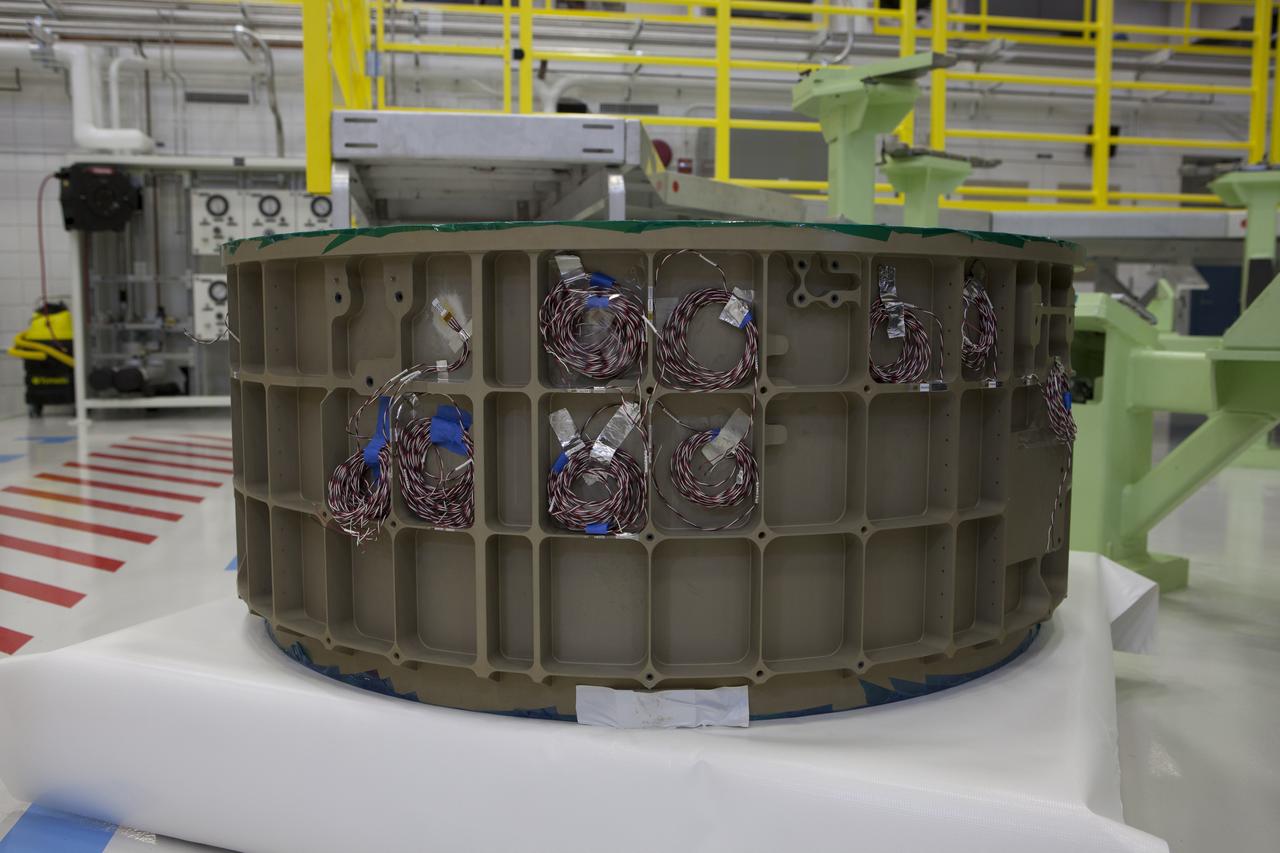 Part of the Boeing CST-100 Structural Test Article awaits testing inside the Commercial Crew and Cargo Processing Facility, or C3PF, at NASA’s Kennedy Space Center in Florida. The test article will serve as a pathfinder for assembling and processing operational CST-100 spacecraft inside the revitalized facility, which for 20 years served as a shuttle processing hangar.