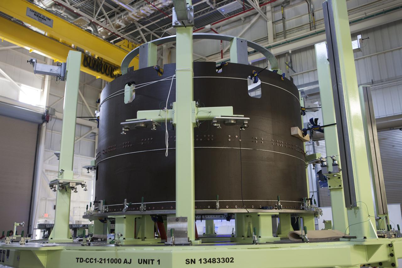 Part of the Boeing CST-100 Structural Test Article rests on a test stand inside the Commercial Crew and Cargo Processing Facility, or C3PF, at NASA’s Kennedy Space Center in Florida. The test article will serve as a pathfinder for assembling and processing operational CST-100 spacecraft inside the revitalized facility, which for 20 years served as a shuttle processing hangar.