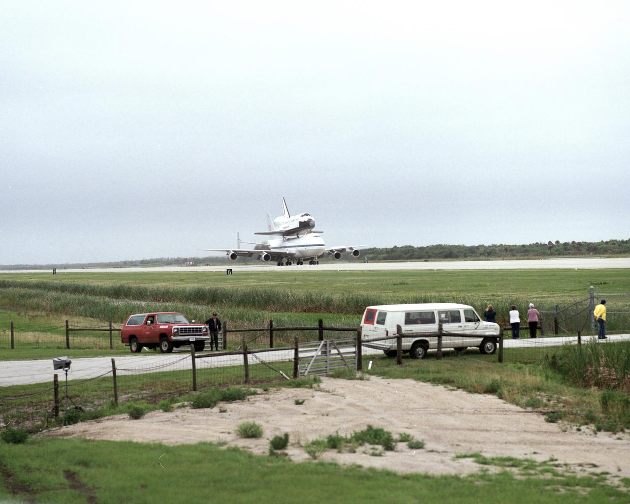 CAPE CANAVERAL, Fla. – At the Kennedy Space Center in Florida, the new space shuttle, Atlantis, arrives at the Shuttle Landing Facility. The shuttle is mounted atop the Shuttle Carrier Aircraft, a modified Boeing 747. Over the next seven months Atlantis will be prepared for its maiden voyage, STS-51J.      Atlantis, NASA's fourth space-rated shuttle, was named after the two-masted boat that served as the primary research vessel for the Woods Hole Oceanographic Institute in Massachusetts from 1930 to 1966. The boat had a 17-member crew and accommodated up to five scientists who worked in two onboard laboratories, examining water samples and marine life. Like its predecessors, Atlantis was constructed by Rockwell International in Palmdale, Calif. The spacecraft was transported over land from Palmdale to Edwards Air Force Base on April 3, 1985 for the cross-country ferry flight to Kennedy. For more: http://www.nasa.gov/centers/kennedy/shuttleoperations/orbiters/atlantis-info.html Photo credit: NASA/Louie Rochefort