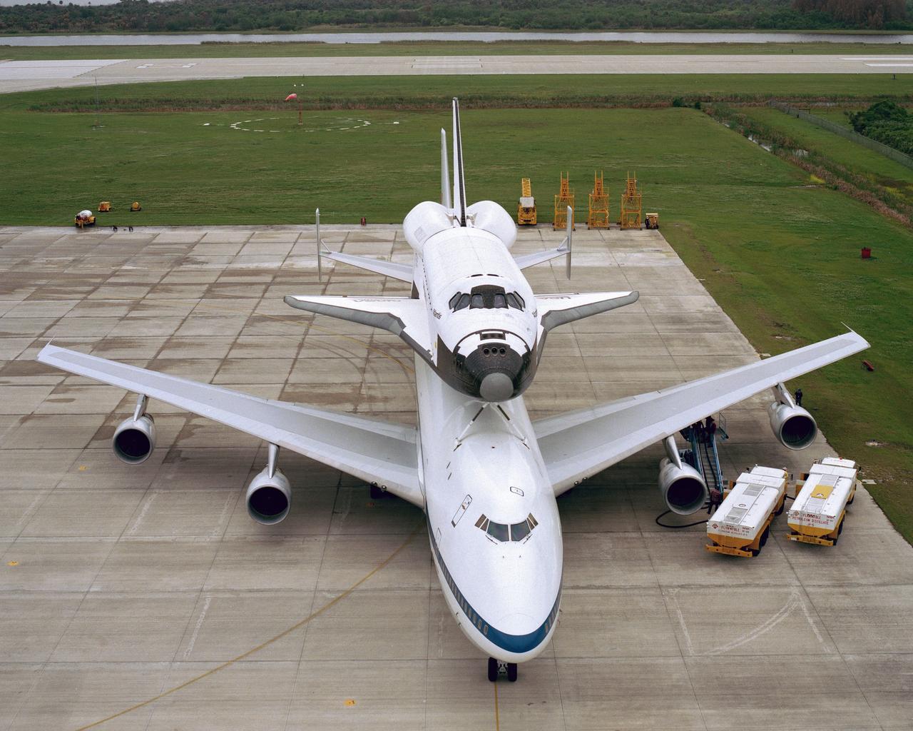 CAPE CANAVERAL, Fla. – At the Kennedy Space Center in Florida, the new space shuttle, Atlantis, arrives at the Shuttle Landing Facility. The shuttle is mounted atop the Shuttle Carrier Aircraft, a modified Boeing 747. Over the next seven months Atlantis will be prepared for its maiden voyage, STS-51J.      Atlantis, NASA's fourth space-rated shuttle, was named after the two-masted boat that served as the primary research vessel for the Woods Hole Oceanographic Institute in Massachusetts from 1930 to 1966. The boat had a 17-member crew and accommodated up to five scientists who worked in two onboard laboratories, examining water samples and marine life. Like its predecessors, Atlantis was constructed by Rockwell International in Palmdale, Calif. The spacecraft was transported over land from Palmdale to Edwards Air Force Base on April 3, 1985 for the cross-country ferry flight to Kennedy. For more: http://www.nasa.gov/centers/kennedy/shuttleoperations/orbiters/atlantis-info.html Photo credit: NASA/Louie Rochefort