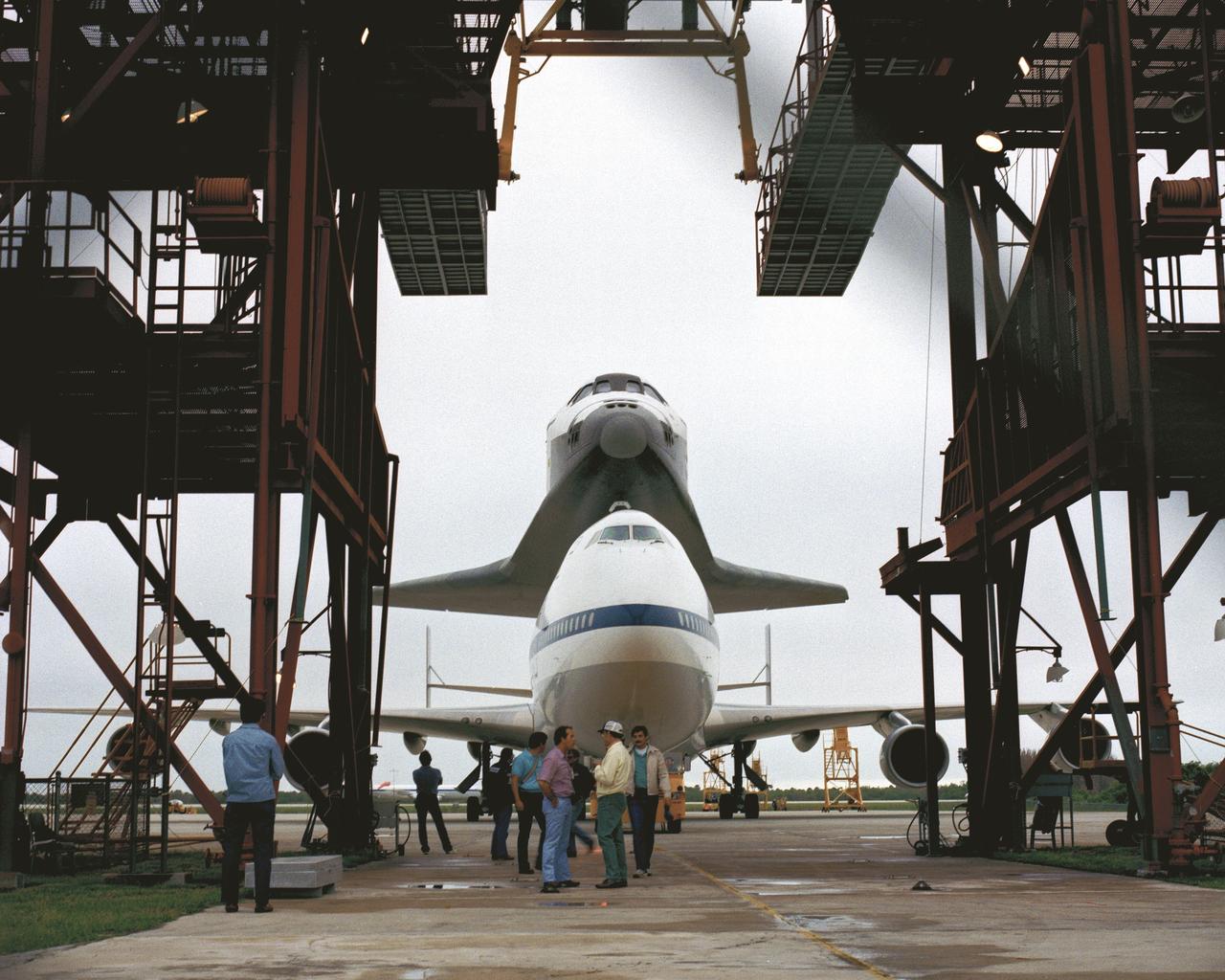 CAPE CANAVERAL, Fla. – At the Kennedy Space Center in Florida, the new space shuttle, Atlantis, arrives at the Shuttle Landing Facility. The shuttle is mounted atop the Shuttle Carrier Aircraft, a modified Boeing 747. Over the next seven months Atlantis will be prepared for its maiden voyage, STS-51J.      Atlantis, NASA's fourth space-rated shuttle, was named after the two-masted boat that served as the primary research vessel for the Woods Hole Oceanographic Institute in Massachusetts from 1930 to 1966. The boat had a 17-member crew and accommodated up to five scientists who worked in two onboard laboratories, examining water samples and marine life. Like its predecessors, Atlantis was constructed by Rockwell International in Palmdale, Calif. The spacecraft was transported over land from Palmdale to Edwards Air Force Base on April 3, 1985 for the cross-country ferry flight to Kennedy. For more: http://www.nasa.gov/centers/kennedy/shuttleoperations/orbiters/atlantis-info.html Photo credit: NASA/Louie Rochefort