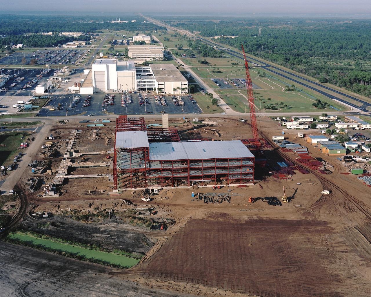 CAPE CANAVERAL Fla. -- This aerial view shows construction progress of the Space Station Processing Facility at the Kennedy Space Center in Florida. Photo Credit: NASA