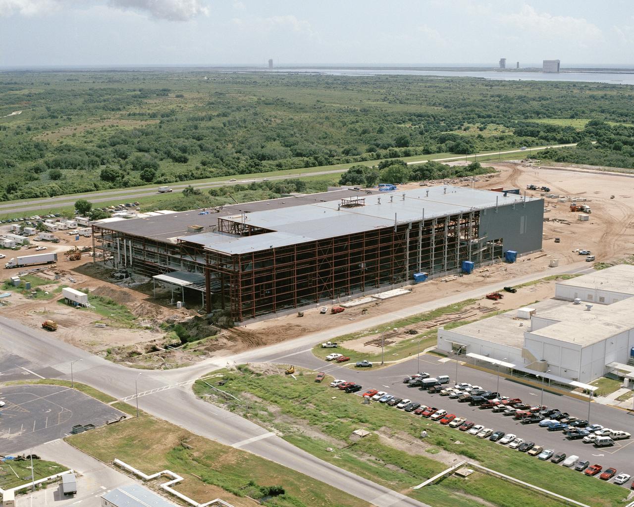 CAPE CANAVERAL Fla. -- This aerial view shows construction progress of the Space Station Processing Facility at the Kennedy Space Center in Florida. Photo Credit: NASA