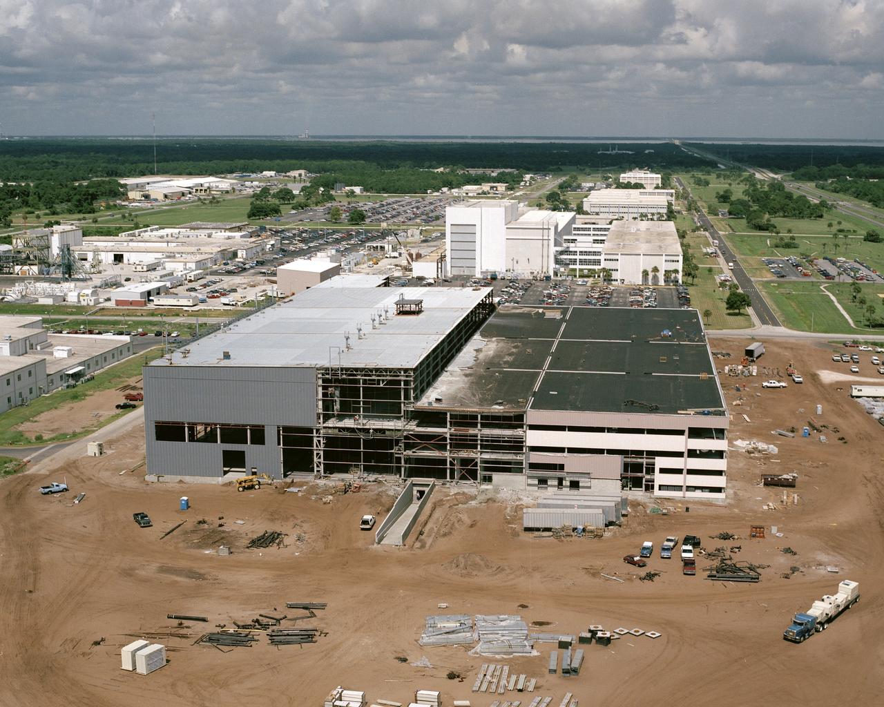 CAPE CANAVERAL Fla. -- This aerial view shows construction progress of the Space Station Processing Facility at the Kennedy Space Center in Florida. Photo Credit: NASA