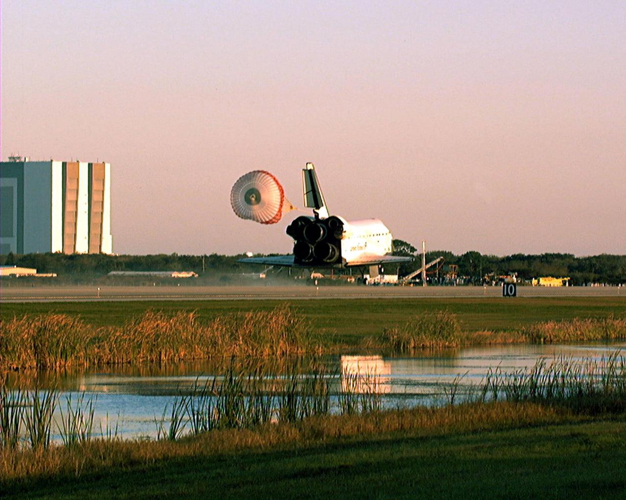 The Space Shuttle orbiter Endeavour touches down on Runway 15 of the KSC Shuttle Landing Facility (SLF) to complete the nearly nine-day STS-89 mission. Main gear touchdown was at 5:35:09 p.m. EST on Jan. 31, 1998. The wheels stopped at 5:36:19 EST, completing a total mission time of eight days, 19 hours, 48 minutes and four seconds. The 89th Space Shuttle mission was the 42nd (and 13th consecutive) landing of the orbiter at KSC, and STS-89 was the eighth of nine planned dockings of the Space Shuttle with the Russian Space Station Mir. STS-89 Mission Specialist Andrew Thomas, Ph.D., succeeded NASA astronaut and Mir 24 crew member David Wolf, M.D., who was on the Russian space station since late September 1997. Dr. Wolf returned to Earth on Endeavour with the remainder of the STS-89 crew, including Commander Terrence Wilcutt; Pilot Joe Edwards Jr.; and Mission Specialists James Reilly, Ph.D.; Michael Anderson; Bonnie Dunbar, Ph.D.; and Salizhan Sharipov with the Russian Space Agency. Dr. Thomas is scheduled to remain on Mir until the STS-91 Shuttle mission returns in June 1998. In addition to the docking and crew exchange, STS-89 included the transfer of science, logistical equipment and supplies between the two orbiting spacecrafts