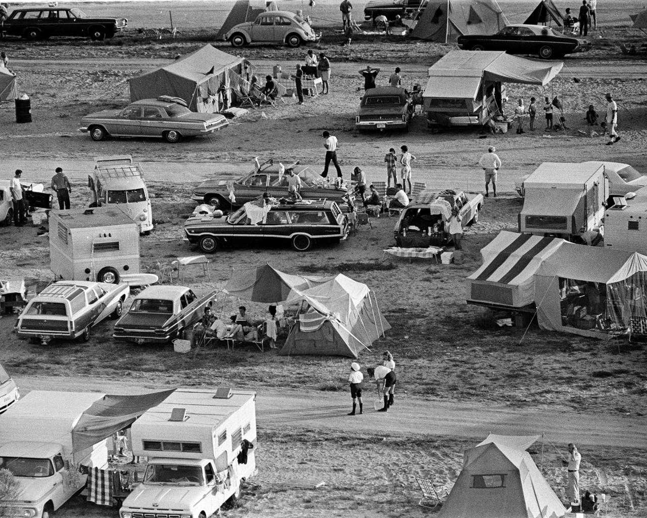 CAPE CANAVERAL, Fla. -- Here are some of the thousands of persons who camped out on beaches and roads adjacent to the Kennedy Space Center to watch the Apollo 11 launch. Local Brevard County officials estimate that one million persons visited the area for the historic liftoff. Photo credit: NASA