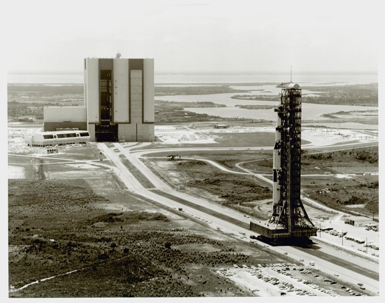 KENNEDY SPACE CENTER, FLA. - Rollout of Apollo 11 Saturn V space vehicle from the VAB's High Bay #1 to Launch Complex 39A. The transporter covered the 3.5-mile distance at an average speed of less than one mile per hour.