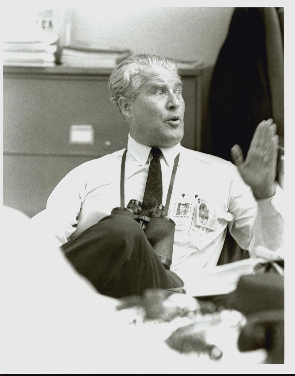 KENNEDY SPACE CENTER, FLA. -  Dr. Wernher von Braun, director of the Marshall Space Flight Center in Huntsville, Ala., relaxes in the Launch Control Center at Kennedy Space Center after the successful launch of Apollo 11.  This historic launch, the first manned landing on the Moon, began at 9:32 a.m. EDT today when the Apollo/Saturn V launch vehicle lifted off from Launch Complex 39A.