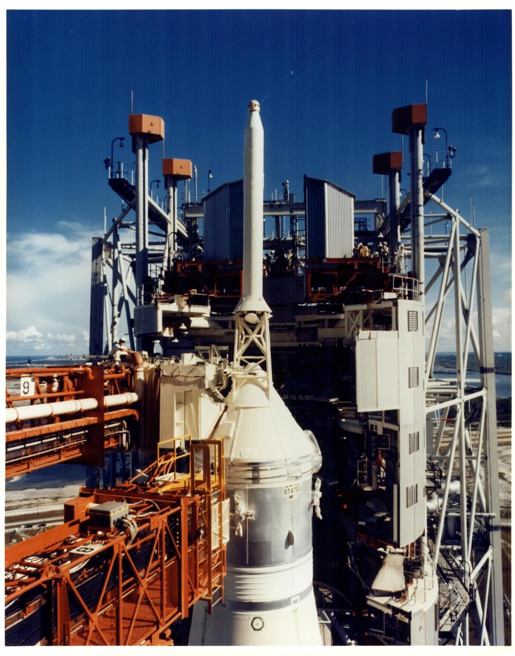 KENNEDY SPACE CENTER, FLA. - The 402-foot-tall mobile service structure is moved away from the Apollo 11 spacecraft at Launch Pad 39A. The move was made during a recent Countdown Demonstration Test, participated in by Apollo 11 astronauts Neil A. Armstrong, Michael Collins and Edwin E. Aldrin Jr.