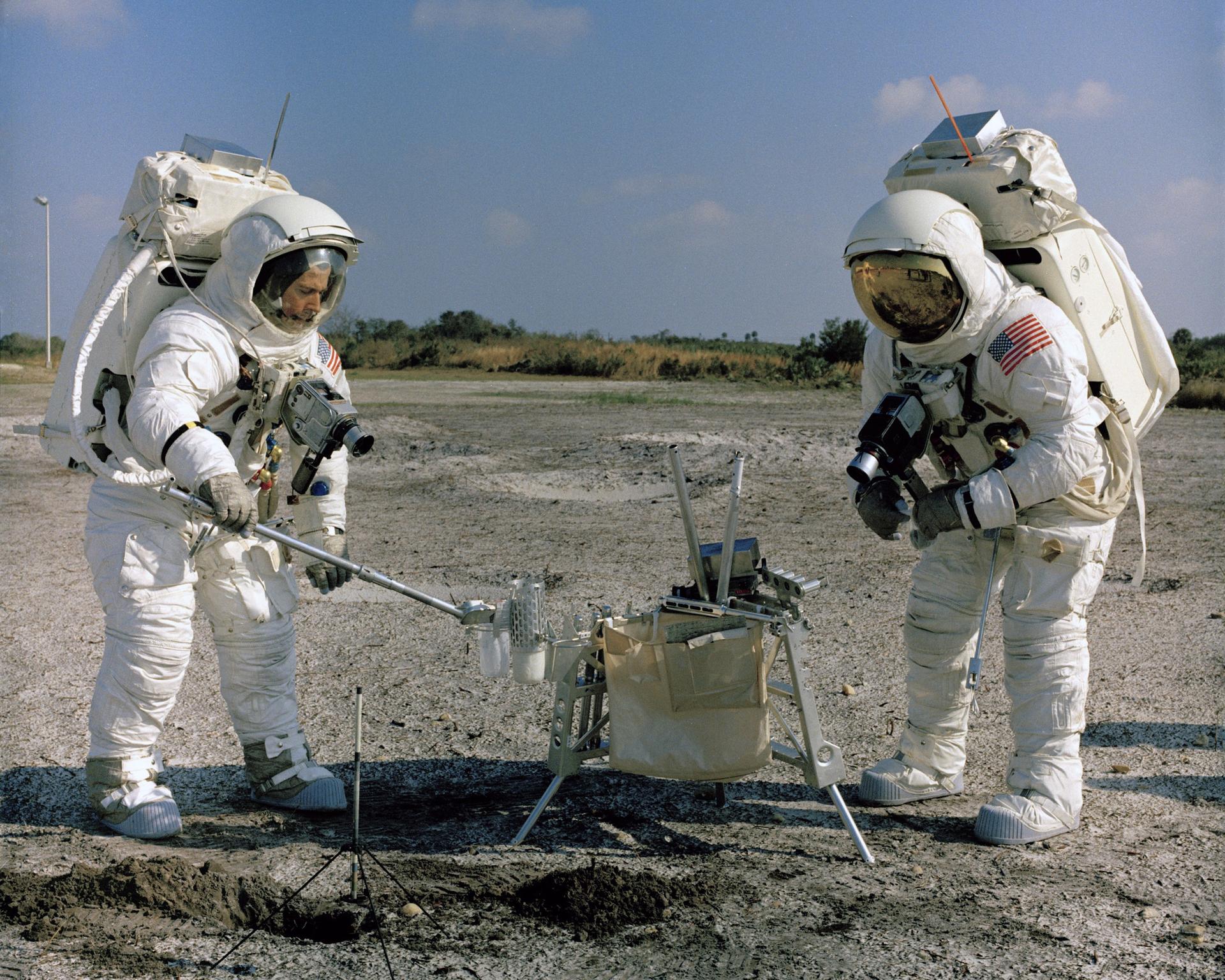 Charlie Duke and John Young in space suits doing lunarEVA training