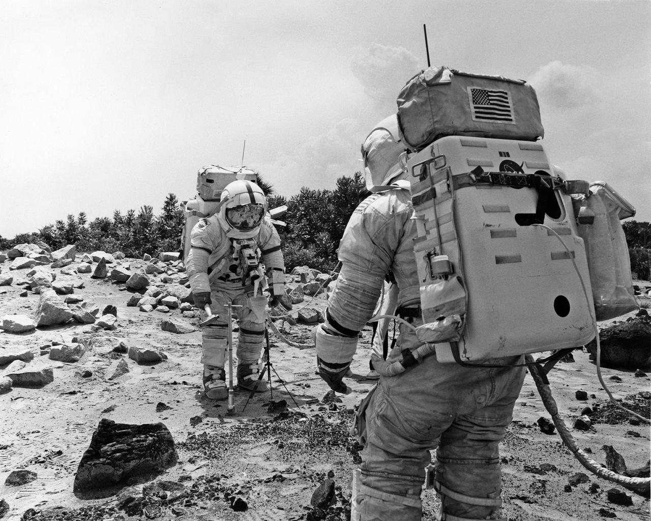 CAPE CANAVERAL, Fla. -- Apollo 17 Astronauts, Eugene A. Cernan, left, and Harrison H. Schmitt conduct simulated lunar surface activity in preparation for their launch to the moon with Ronald E. Evans. The three space pilots will be launched to the moon aboard an Apollo_Saturn V space vehicle no earlier than December 6, 1972. Photo credit: NASA