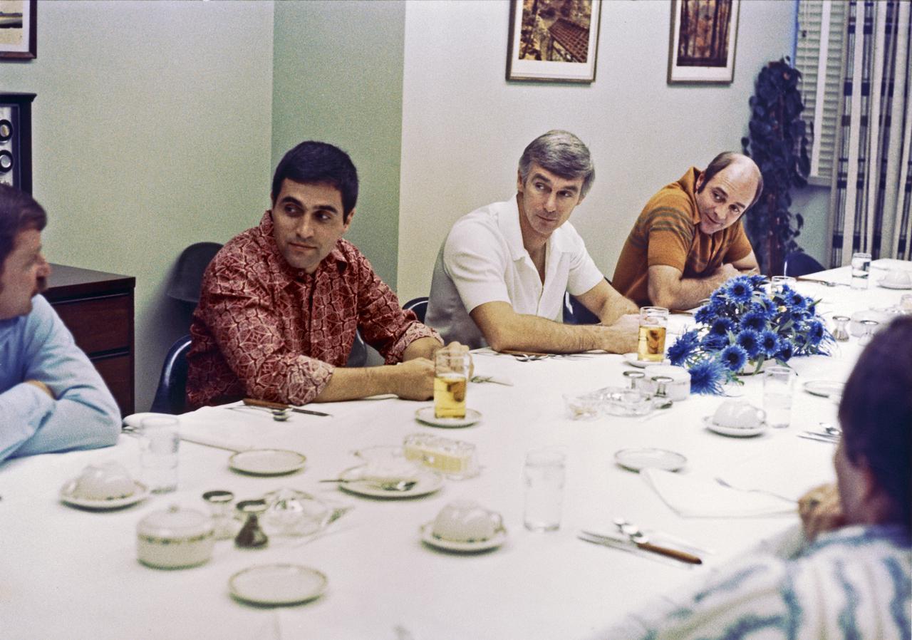 About 4 1_2 hours prior to launch to the Moon from Kennedy Space Center, the Apollo 17 astronauts relax in crew quarters during dinner.  They are, left to right, Harrison H. Schmitt, Eugene A. Cernan and Ronald E. Evans.