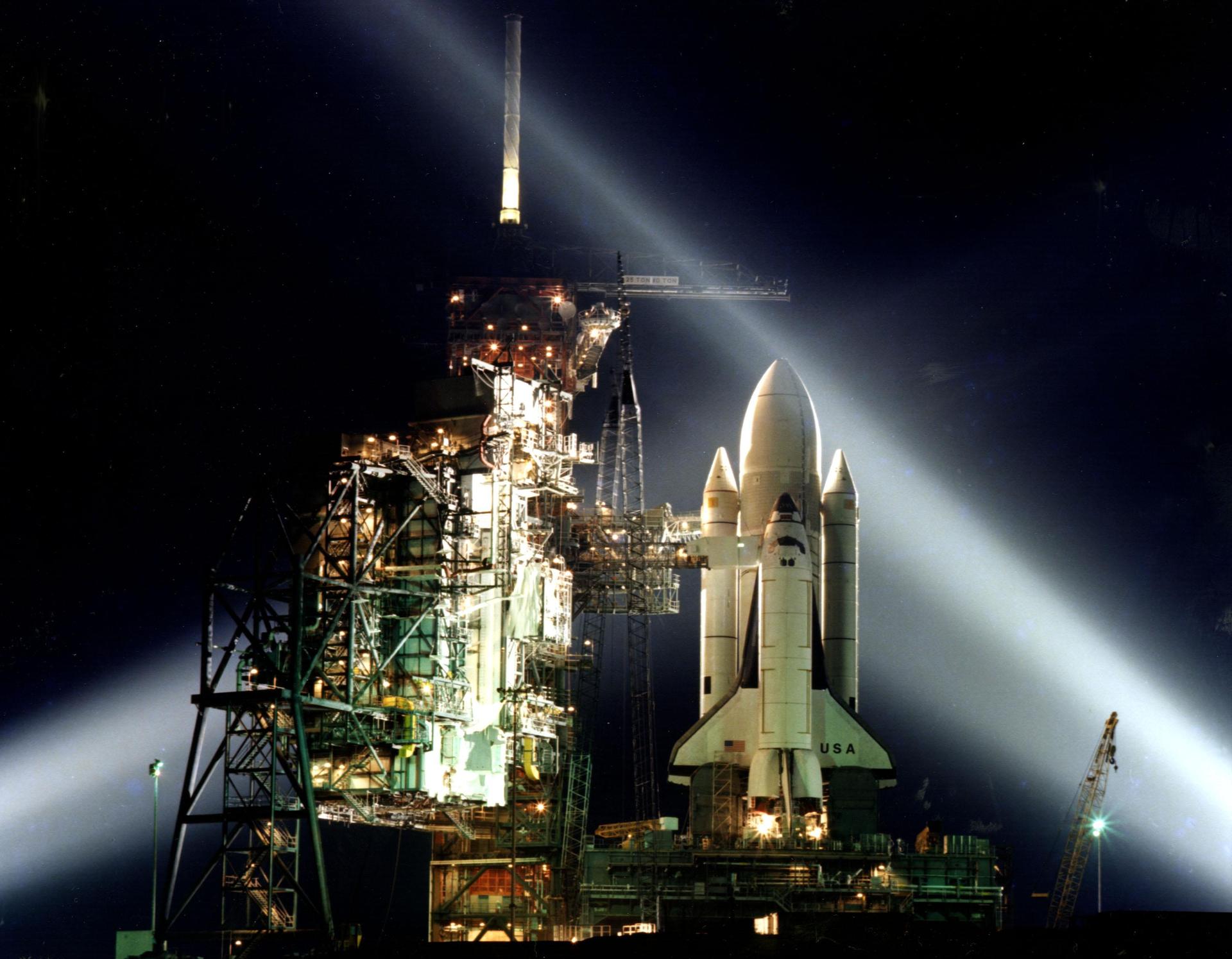 Space Shuttle STS-1 at night on a brightly lit Launch Pad A, Complex 3