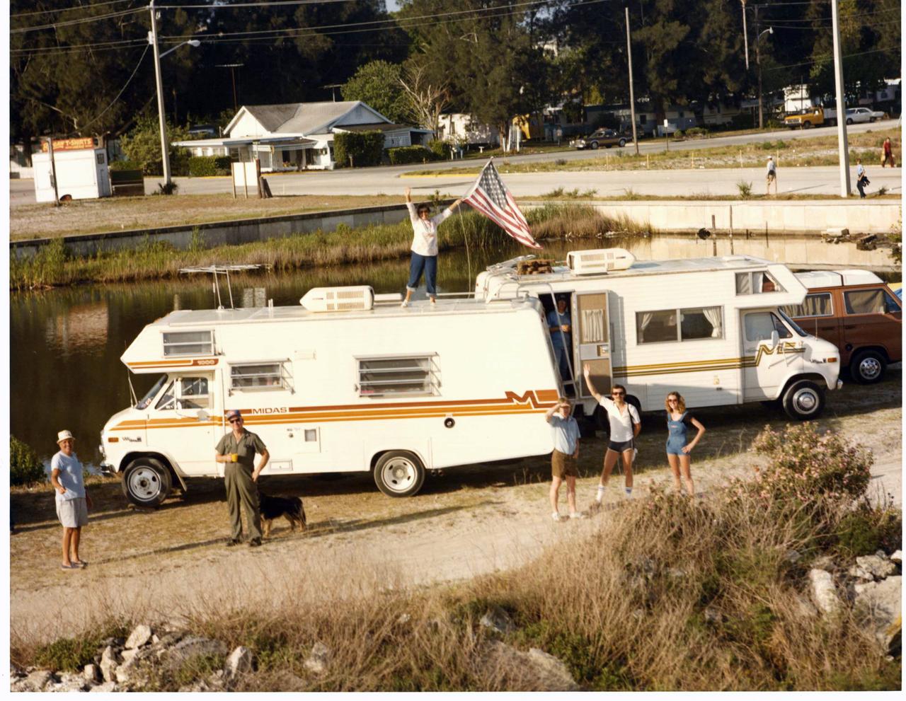 Go Columbia! Go America! Enthused by the sight of the space shuttle launch, one of the thousands of observers in Brevard County waves an American flag as Columbia heads skyward. Many people waited all night at viewing sites to assure that they would witness the historic first launch of the space shuttle. 
