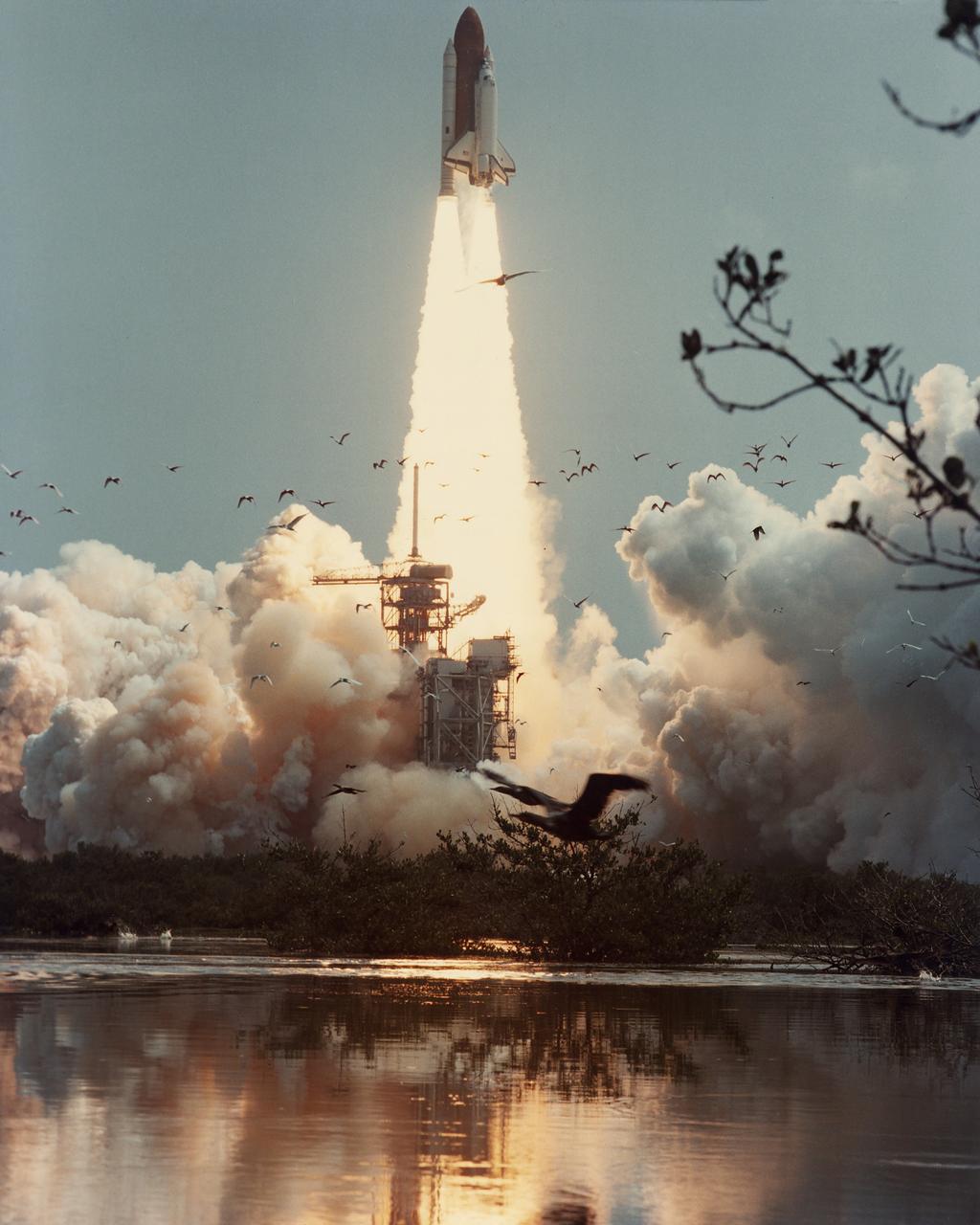 CAPE CANAVERAL, Fla. - STS-4 thunders away from Launch Pad 39A at 10:59:59 a.m. EDT, bound for a seven-day Earth orbital mission and the final developmental flight for the Space Transportation System. The fourth Space Shuttle mission is piloted by Commander Ken Mattingly and Pilot Henry Hartsfield Jr. Photo Credit: NASA