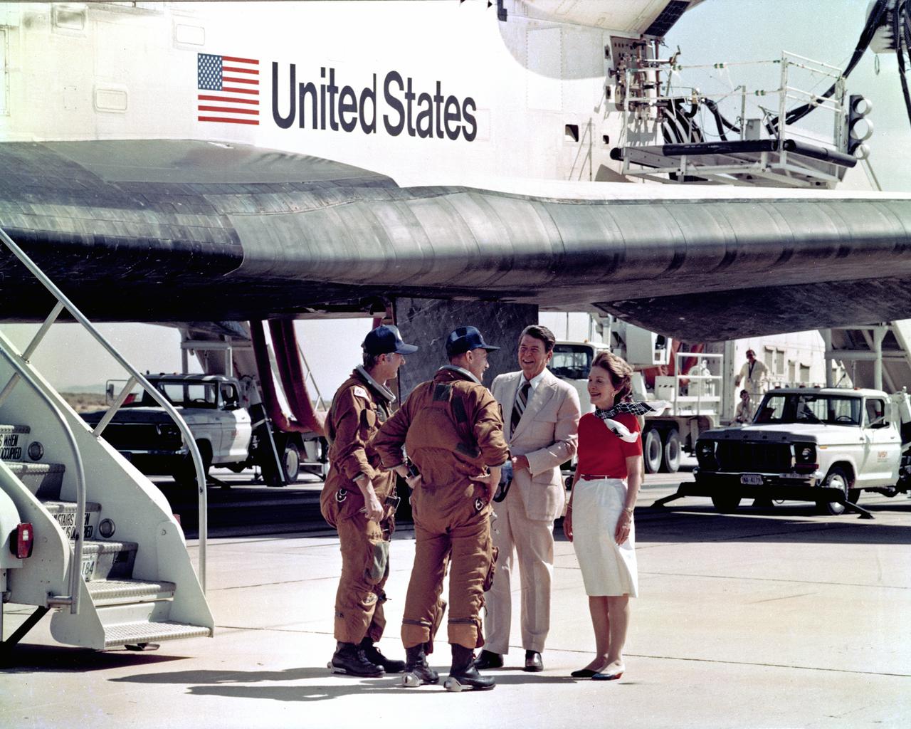 CAPE CANAVERAL, Fla. -- President and First Lady Reagan meet astronauts Thomas K. Mattingly II and Henry W. Hartsfield Jr. after the landing of space shuttle Columbia at Edwards Air Force Base in California.  Photo credit: NASA