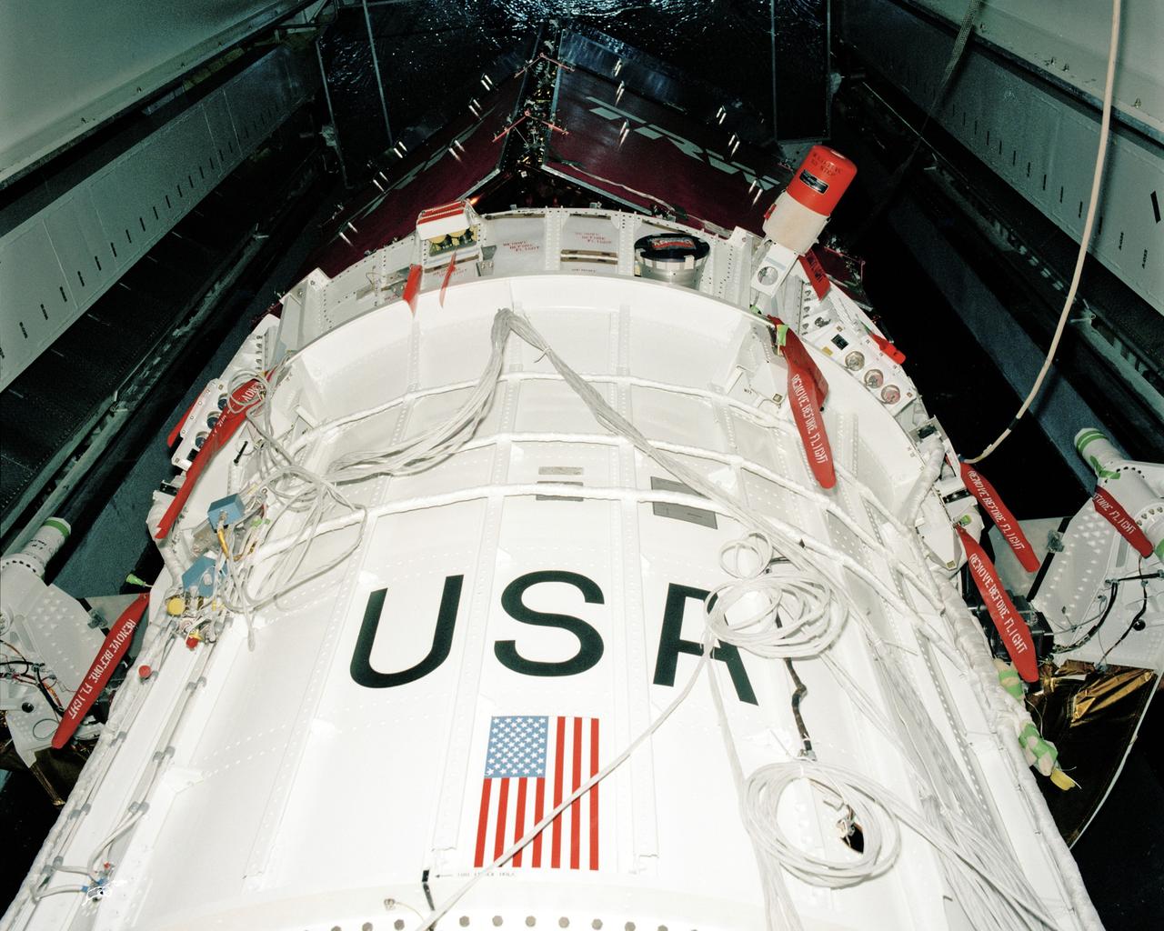 CAPE CANAVERAL, Fla. – ANIK/TDRS installation into payload canister. Photo credit: NASA