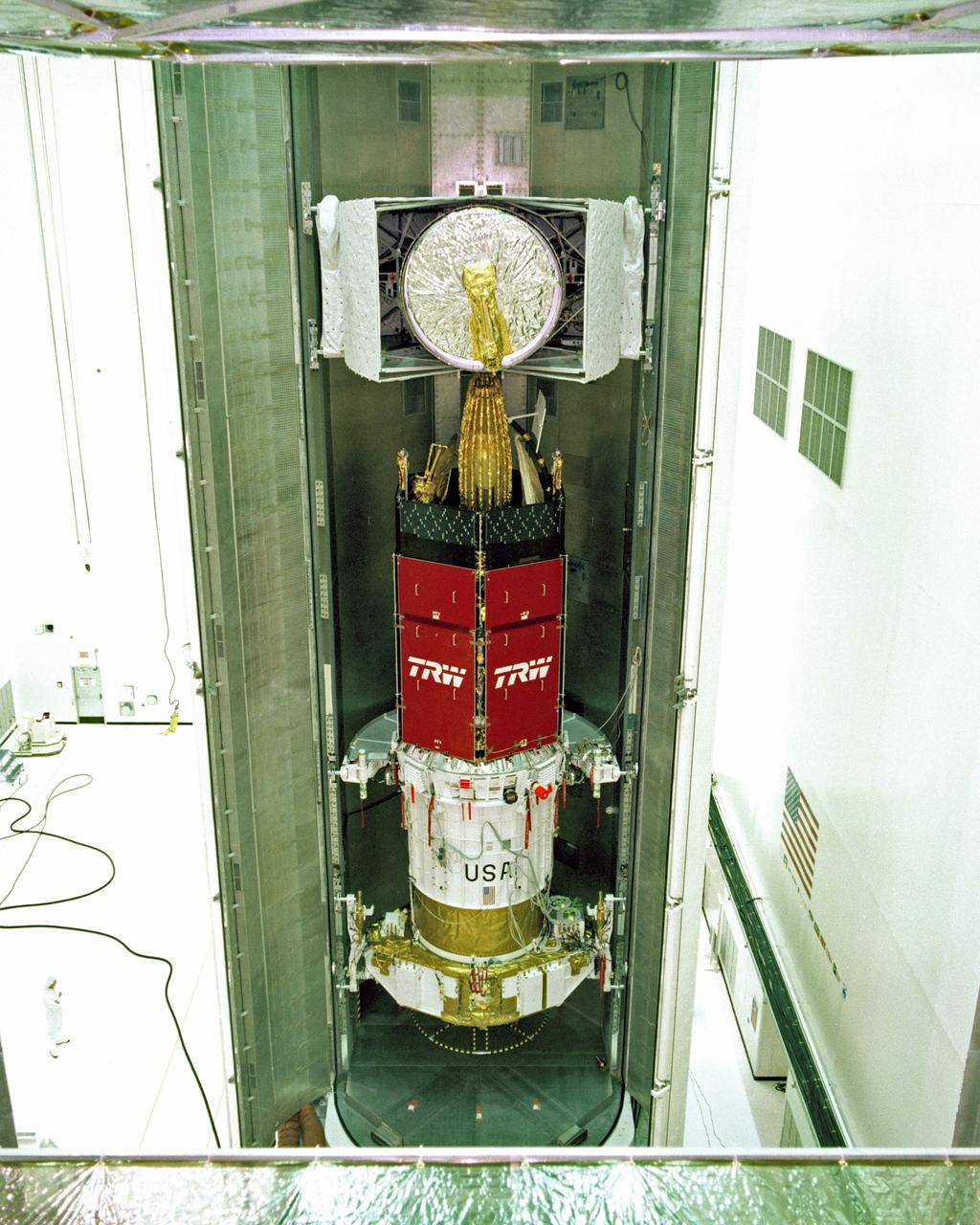 CAPE CANAVERAL, Fla. – ANIK/TDRS installation into payload canister. Photo credit: NASA