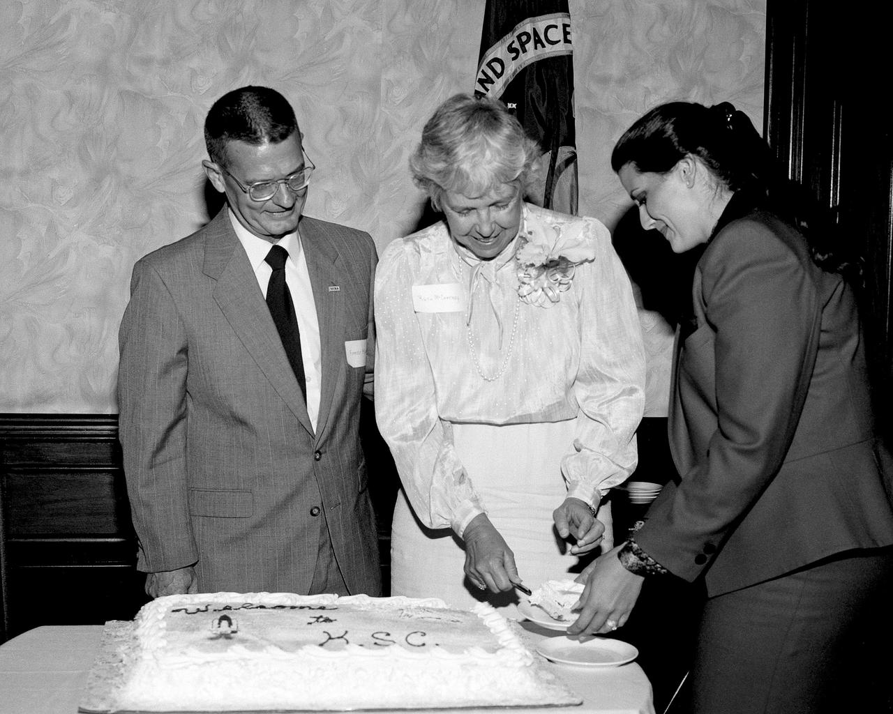 CAPE CANAVERAL, Fla. - Kennedy Space Center Director Forrest McCartney and his wife, Ruth, cut a "Welcome to KSC" cake, with the assistance of NKMA member Susan Hilding, at the NASA Kennedy Management Association meeting. Photo credit: NASA