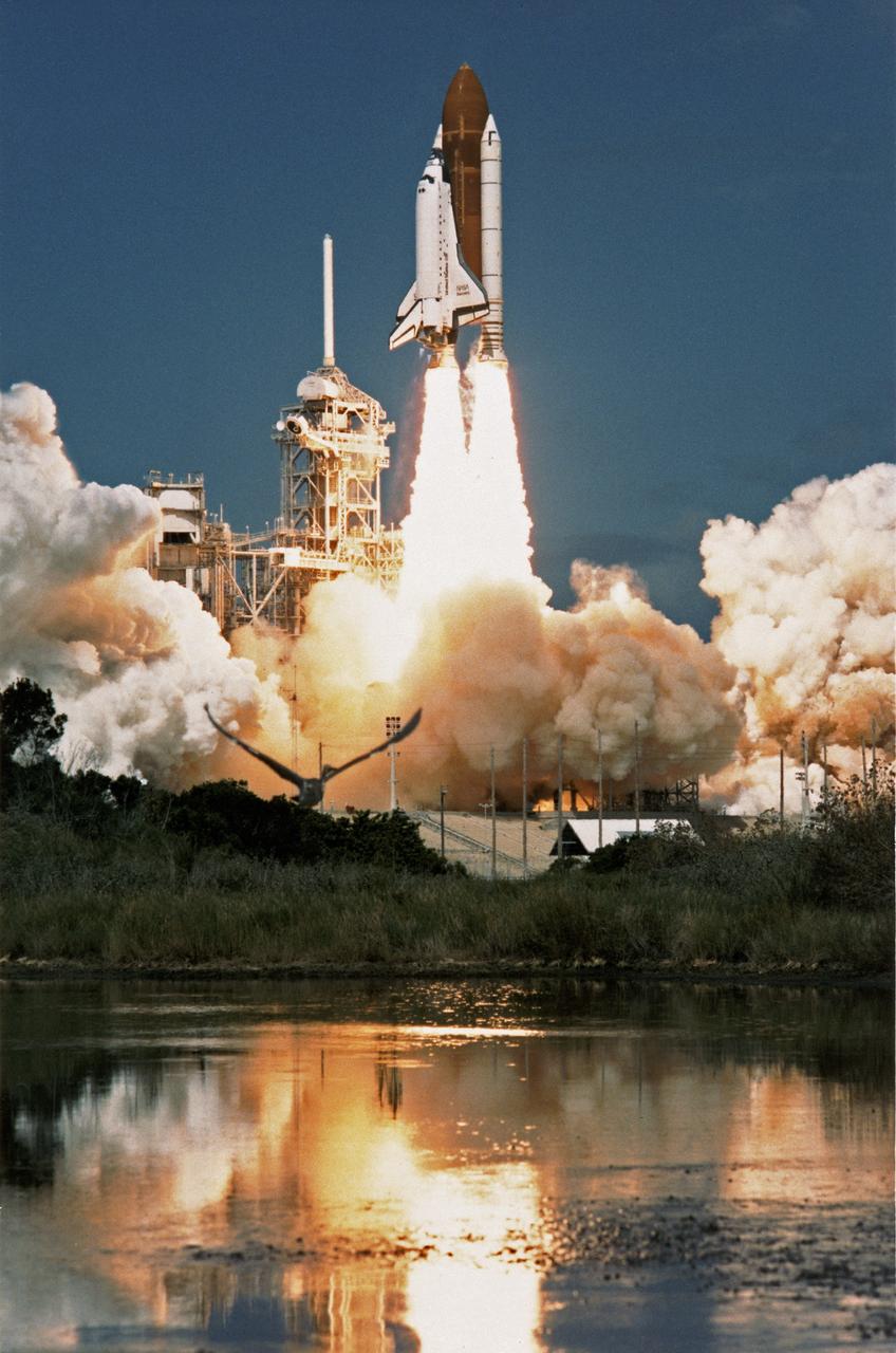 CAPE CANAVERAL, Fla. - The space shuttle Discovery and its five-man crew is launched from pad 39B at 11:37 a.m. as STS-26 embarks on a four-day mission marking America's return to space.     On the first day of orbit, the crew will deploy from the orbiter's payload bay the primary payload, the Tracking and Data Relay Satellite, or TDRS-C. The inertial upper stage, or IUS, will boost the satellite to a geosynchronous altitude from low Earth orbit. When it place, TDRS-C will relay date from low Earth orbiting spacecraft and air-to-ground voice communications sand television from shape shuttle orbiters during missions. The crew members of STST-26 are Commander Rick Hauck, Pilot Richard Covey, and mission specialists Dave Hilmers, Mike Lounge and George "Pinky" Nelson. Photo Credit: NASA