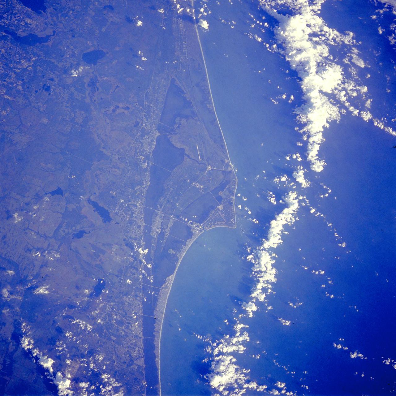 STS-26 ONBOARD - The Kennedy Space Center, Cape Canaveral, and most of Brevard County, Florida, are clearly visible in this photo taken by the crew of the orbiter Discovery while in orbit during space shuttle mission STS-26.