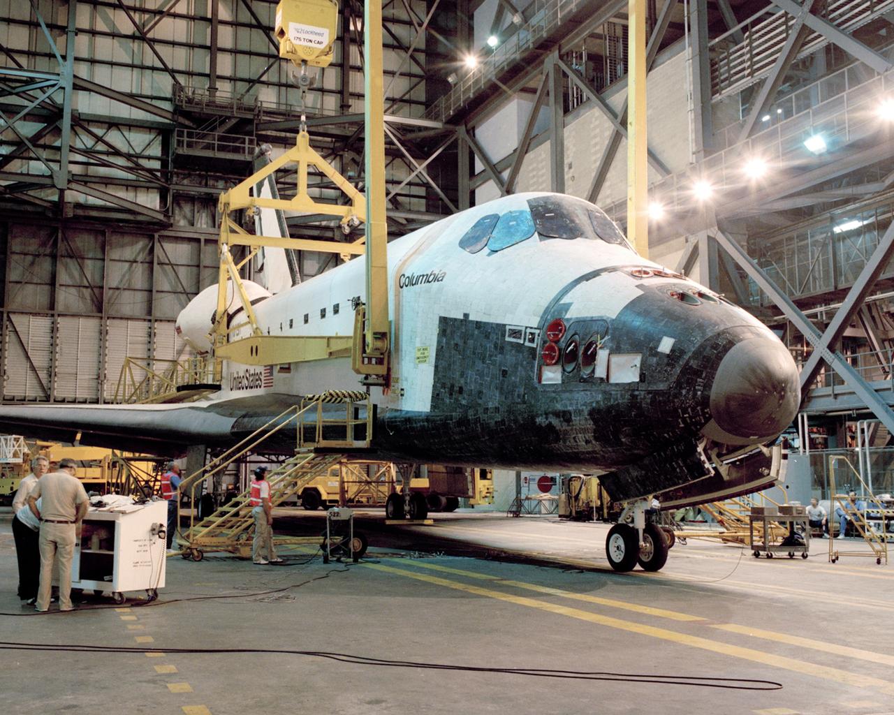 CAPE CANAVERAL, Fla. – Following the rollover from the OPF, the orbiter Columbia is prepared for mating with the ET/SRB stack in the VAB. Columbia is scheduled for launch in late July 1989. Photo credit: NASA