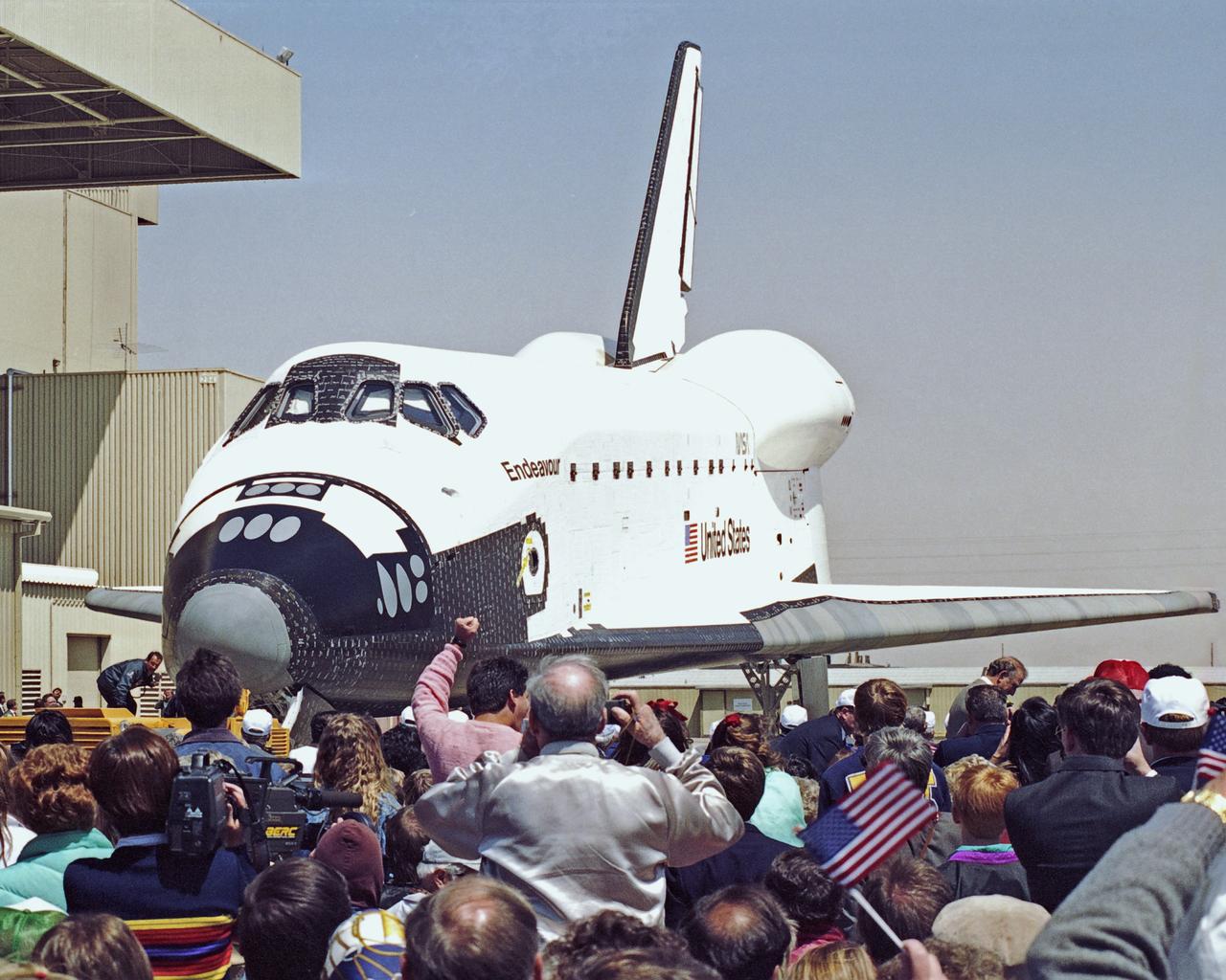 The newest space shuttle orbiter, Endeavour is ready to roll out of the hangar at Palmdale, Calif. OV-105 features many design enhancements, including a drag chute for safer landings and equipment to allow the orbiter to remain in space for up to 28 days. Photo credit: NASA