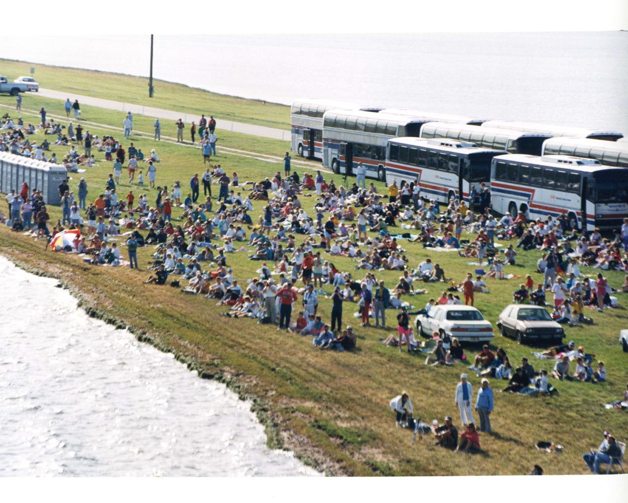 This aerial view is of a tour stop on the KSC bus tour, the Launch Complex 39 Observation Gantry. This stop allows visitors to view and photograph Pads A and B in Launch Complex 39 from an elevated vantage point. The roadway leading to the tour stop runs next to the crawlerway (left) which is used to transport Space Shuttles from the Vehicle Assembly Building to the pads. Pad A can be seen in the background. 
