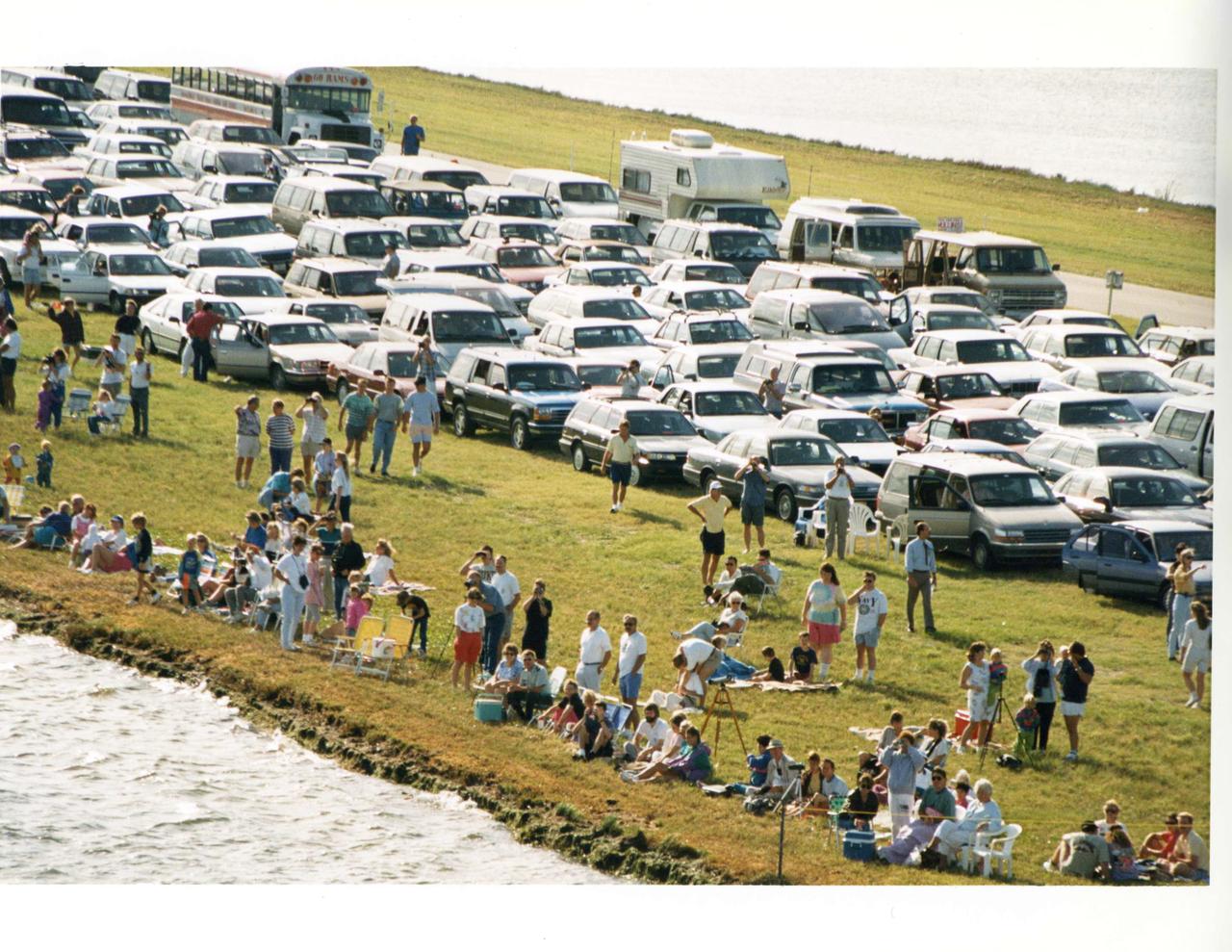 Aerial of the NASA Causeway East showing the viewing area set up for space shuttle launch viewers with car passes. Launch Complex 39 is to the north.