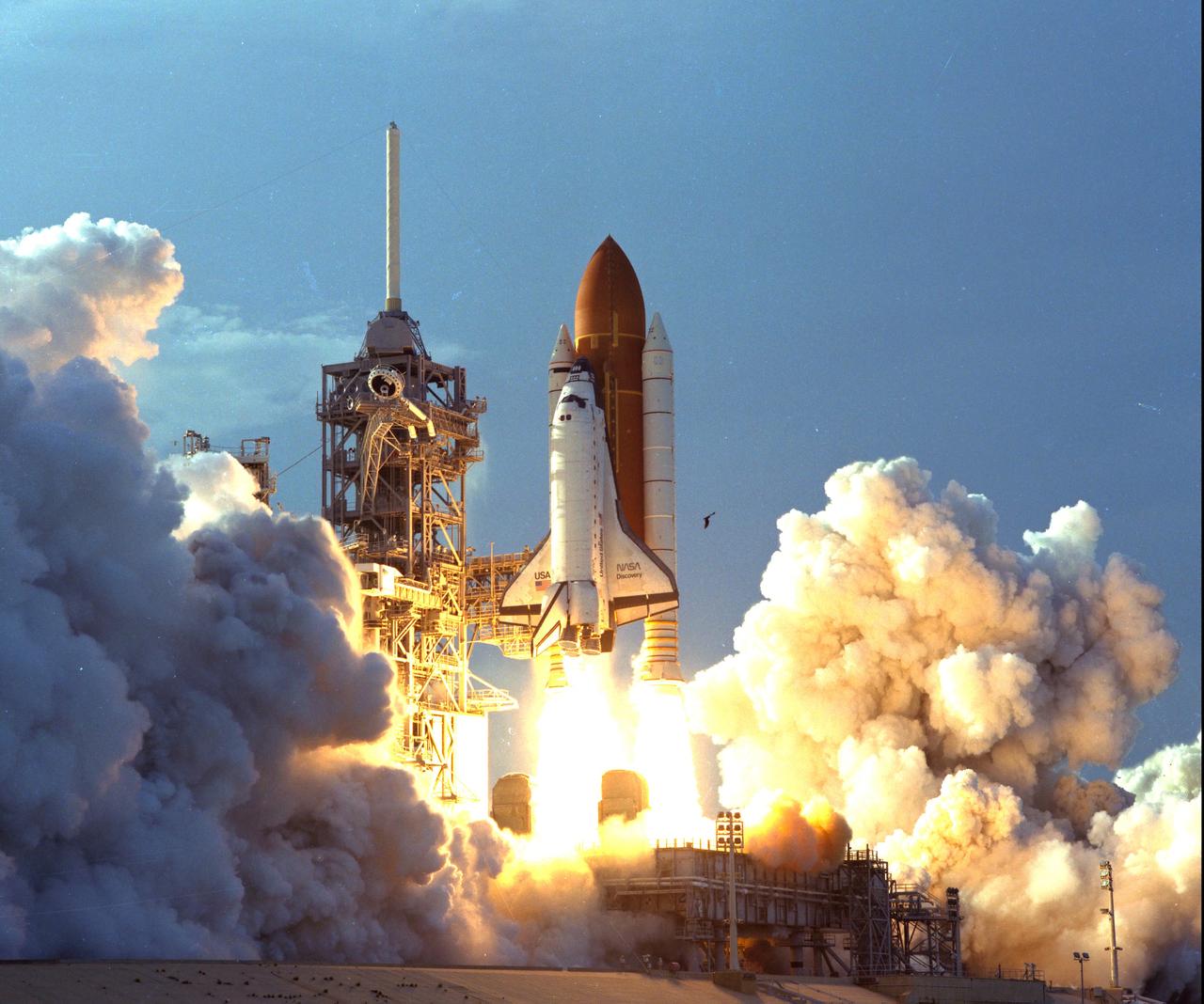 KENNEDY SPACE CENTER, FLA. - The turbulent weather common to a Florida afternoon in the summer subsides into a serene canopy of cornflower blue, and a manmade "bird" takes flight.  The Space Shuttle Discovery soars skyward from Launch Pad 39B on Mission STS-64 at 6:22:35 p.m. EDT, Sept. 9.  On board are a crew of six: Commander Richard N. Richards; Pilot L. Blaine Hammond Jr.; and Mission Specialists Mark C. Lee, Carl J. Meade, Susan J. Helms and Dr. J.M. Linenger.  Payloads for the flight include the Lidar In-Space Technology Experiment (LITE), the Shuttle Pointed Autonomous Research Tool for Astronomy-201 (SPARTAN-201) and the Robot Operated Material Processing System (ROMPS).  Mission Specialists Lee and Meade also are scheduled to perform an extravehicular activity during the 64th Shuttle mission.