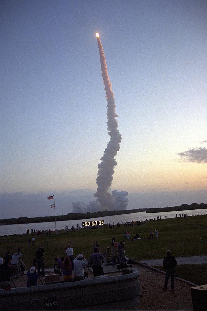KENNEDY SPACE CENTER, FLA. -- The Space Shuttle Endeavour lifts off from launch Pad 39A on April 9, 1994, at 7:05 a.m. EDT to begin the nine-day STS-59/Space Radar Laboratory mission. The mission countdown clock also can be seen,  giving the time into the mission after liftoff. The STS-59 mission is  scheduled to end with a landing at KSC's Shuttle Landing Facility.