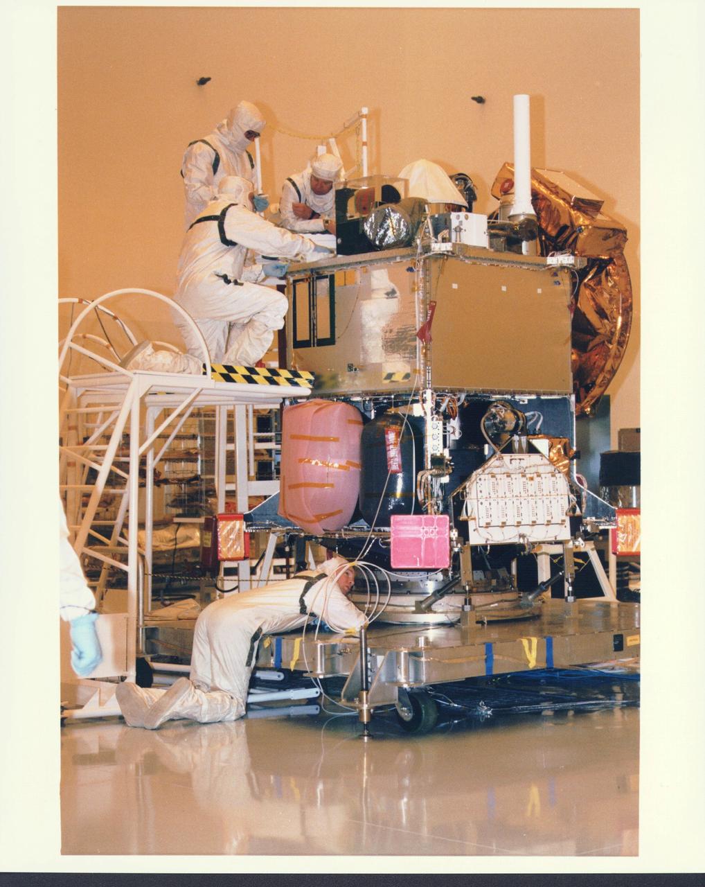 KENNEDY SPACE CENTER, FLA. -  In the Payload Hazardous Servicing Facility at KSC, installation is under way of the Mars Orbiter Camera (MOC) on the Mars Global Surveyor spacecraft.  The MOC is one of a suite of six scientific instruments that will gather data about Martian topography, mineral distribution and weather during a two-year period.  The Mars Global Surveyor is slated for launch aboard a Delta II expendable launch vehicle on Nov. 6, the beginning of a 20-day launch period.