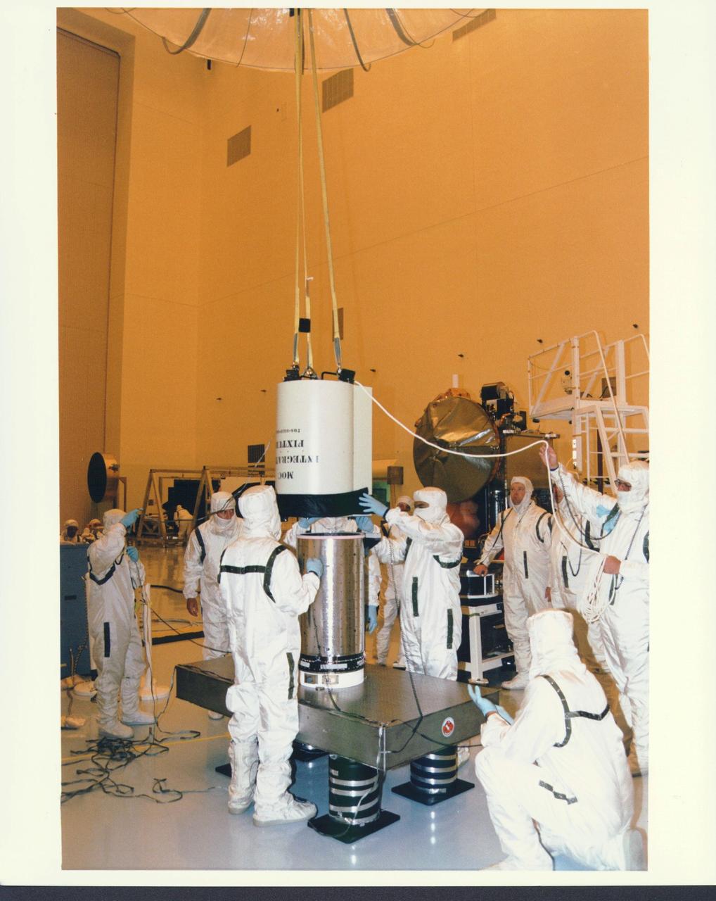 KENNEDY SPACE CENTER, FLA. -  In the Payload Hazardous Servicing Facility at KSC, installation is under way of the Mars Orbiter Camera (MOC) on the Mars Global Surveyor spacecraft.  The MOC is one of a suite of six scientific instruments that will gather data about Martian topography, mineral distribution and weather during a two-year period.  The Mars Global Surveyor is slated for launch aboard a Delta II expendable launch vehicle on Nov. 6, the beginning of a 20-day launch period.