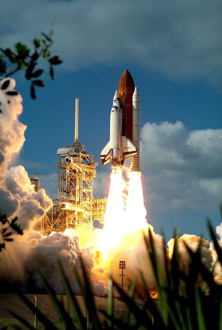 KENNEDY SPACE CENTER, FLA. -- A diversified mission of astronomy, commercial space research and International Space Station preparation gets under way as the Space Shuttle Columbia climbs into orbit from Launch Pad 39B at 2:55:47 p.m. EST, November 19, 1996. During Mission STS-80, Columbia's five-person crew will deploy and retrieve two free-flying spacecraft, conduct two spacewalks and perform a variety of microgravity research experiments in the Shuttleþs middeck area. The veteran crew is led by Commander Kenneth D. Cockrell; Kent V. Rominger is the pilot and the three mission specialists are Tamara E. Jernigan, Story Musgrave and Thomas D. Jones. At age 61, Musgrave becomes the oldest person ever to fly in space; he also ties astronaut John Young's record for most number of spaceflights by a human being, and in embarking on his sixth Shuttle flight Musgrave has logged the most flights ever aboard NASA's reusable space vehicle. The two primary payloads for STS-80 are the Wake Shield Facility-3 (WSF-3) and the Orbiting and Retrievable Far and Extreme Ultraviolet Spectrometer-Shuttle Pallet Satellite II (ORFEUS-SPAS II).