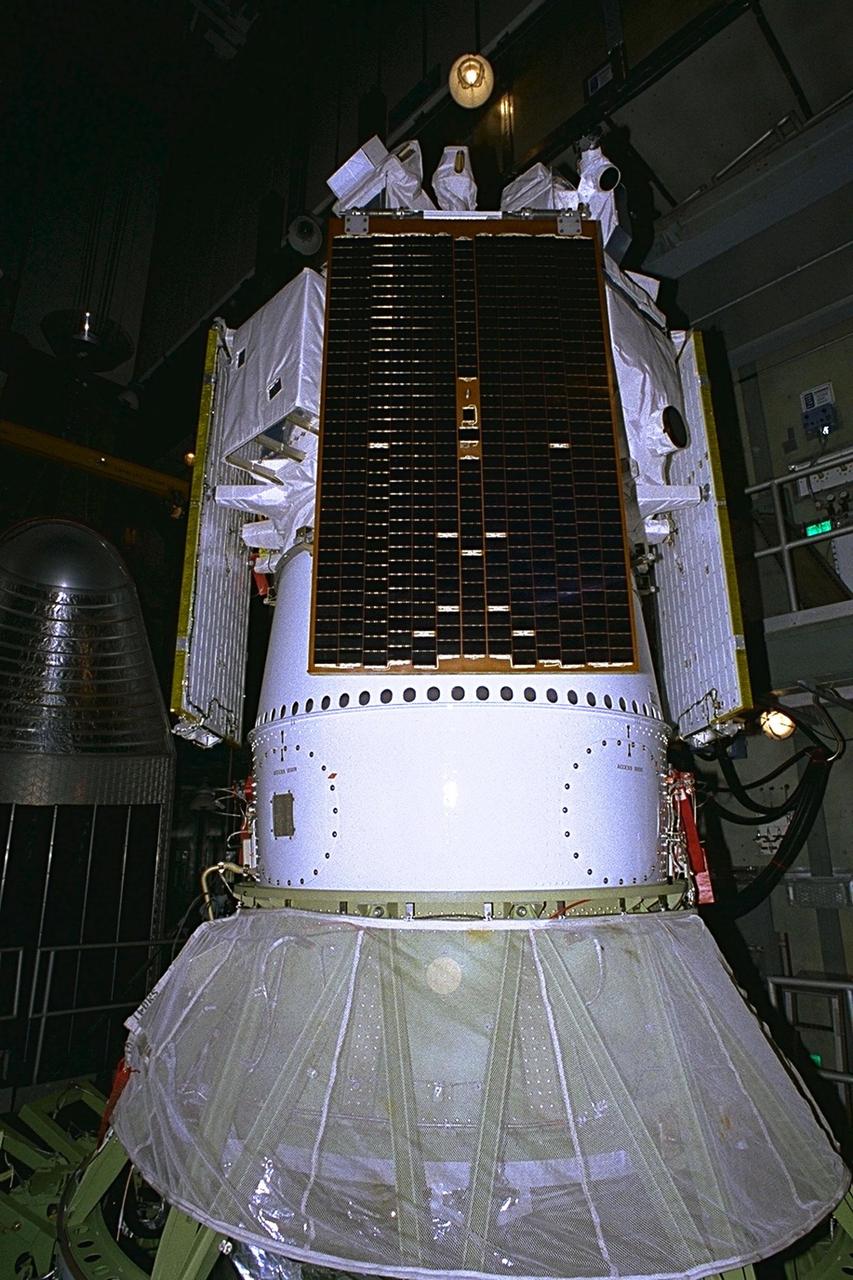 Final prelaunch preparations are made at Launch Complex 17A, Cape Canaveral Air Station, for liftoff of the Boeing Delta II expendable launch vehicle with the Advanced Composition Explorer (ACE) spacecraft, at top. The black rectangular-shaped panel in front is one of ACE’s solar arrays. ACE will investigate the origin and evolution of solar phenomenon, the formation of solar corona, solar flares and acceleration of the solar wind. This will be the second Delta launch under the Boeing name and the first from Cape Canaveral. Liftoff is scheduled Aug. 24