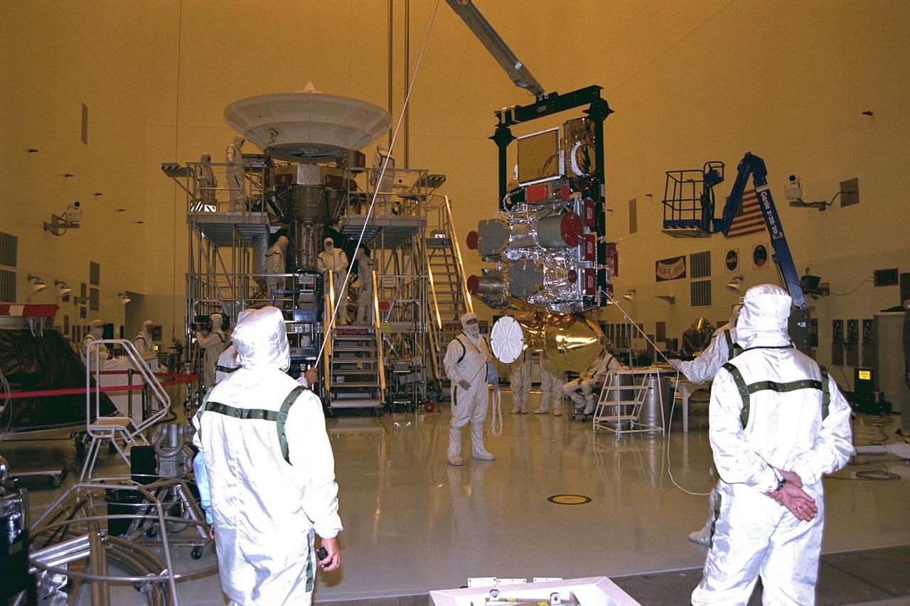 Technicians from the Jet Propulsion Laboratory (JPL) of the California Institute of Technology lift the remote sensing pallet in the Payload Hazardous Servicing Facility at KSC in July prior to installation on the Cassini spacecraft. A four- year, close-up study of the Saturnian system, the Cassini mission is scheduled for launch from Cape Canaveral Air Station in October 1997. It will take seven years for the spacecraft to reach Saturn. Scientific instruments carried aboard the spacecraft will study Saturn’s atmosphere, magnetic field, rings, and several moons. JPL is managing the Cassini project for NASA