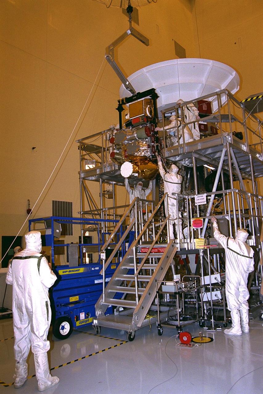 The complete remote sensing pallet is lowered by technicians from the Jet Propulsion Laboratory (JPL) of the California Institute of Technology and mated at the interface with the Cassini spacecraft in the Payload Hazardous Servicing Facility at KSC in July. A four-year, close-up study of the Saturnian system, the Cassini mission is scheduled for launch from Cape Canaveral Air Station in October 1997. It will take seven years for the spacecraft to reach Saturn. Scientific instruments carried aboard the spacecraft will study Saturn’s atmosphere, magnetic field, rings, and several moons. JPL is managing the Cassini project for NASA