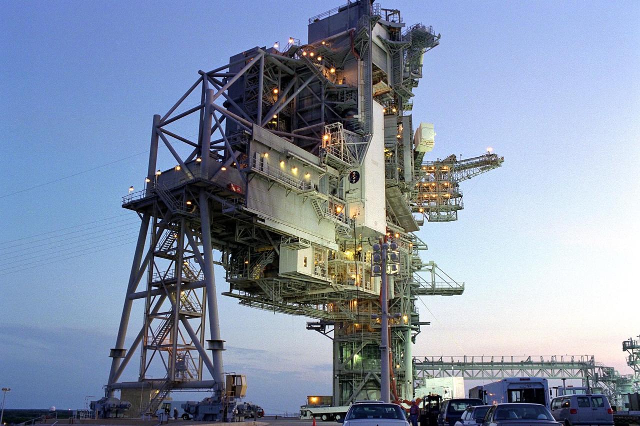KENNEDY SPACE CENTER, Fla. -- The payload canister containing the Cryogenic  Infrared Spectrometers and Telescopes for the Atmosphere-Shuttle Pallet Satellite-2  (CRISTA-SPAS-2) payload for the STS-85 mission is hoisted to the Payload Changeout  Room (PCR) at Launch Pad 39A. Also in the canister are the Technology Applications  and Science-1 (TAS-1) and International Extreme Ultraviolet Hitchhiker-2 (IEH-2)  payloads. All three will be transferred from the PCR into the payload bay of the Space  Shuttle Orbiter Discovery after the space vehicle arrives at the pad. The CRISTA is a  system of three telescopes and four spectrometers to measure infrared radiation emitted  by the Earth’s middle atmosphere. During the 11-day mission, the CRISTA-SPAS-2 free-flying satellite will be deployed from Discovery and retrieved later in the flight. Also  onboard the satellite will be the Middle Atmosphere High Resolution Spectrograph  Investigation (MAHRSI) to measure ultraviolet radiation emitted and scattered by the  Earth’s atmosphere. The TAS-1 holds seven separate experiments that will provide data  on the Earth’s topography and atmosphere, study the sun’s energy, and test new thermal  control devices, as well as several student-developed experiments. The IEH-2 experiments will study ultraviolet radiation from stars, the sun and in the solar system