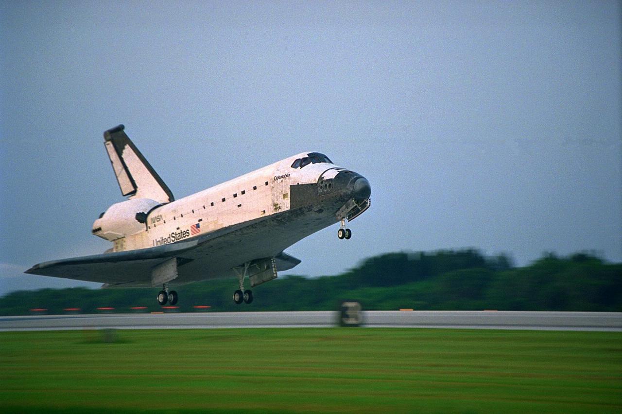 KENNEDY SPACE CENTER, FLA. -- The Space Shuttle orbiter Columbia touches  down on Runway 33 at KSC’s Shuttle Landing Facility at 6:46:34 a.m. EDT with  Mission Commander  James D. Halsell Jr. and Pilot Susan L. Still at the controls to  complete the STS-94 mission. Also on board are Mission Specialist Donald A. Thomas,  Mission Specialist Michael L. Gernhardt, Payload Commander Janice Voss, and Payload  Specialists Roger K. Crouch and Gregory T. Linteris. During the Microgravity Science  Laboratory-1 (MSL-1) mission, the Spacelab module was used to test some of the  hardware, facilities and procedures that are planned for use on the International Space  Station while the flight crew conducted combustion, protein crystal growth and materials  processing experiments. This mission was a reflight of  the STS-83 mission that lifted off   from KSC in April of this year. That space flight was cut short due to indications of a  faulty fuel cell. This was Columbia’s 11th landing at KSC and the 38th landing at the  space center in the history of the Shuttle program