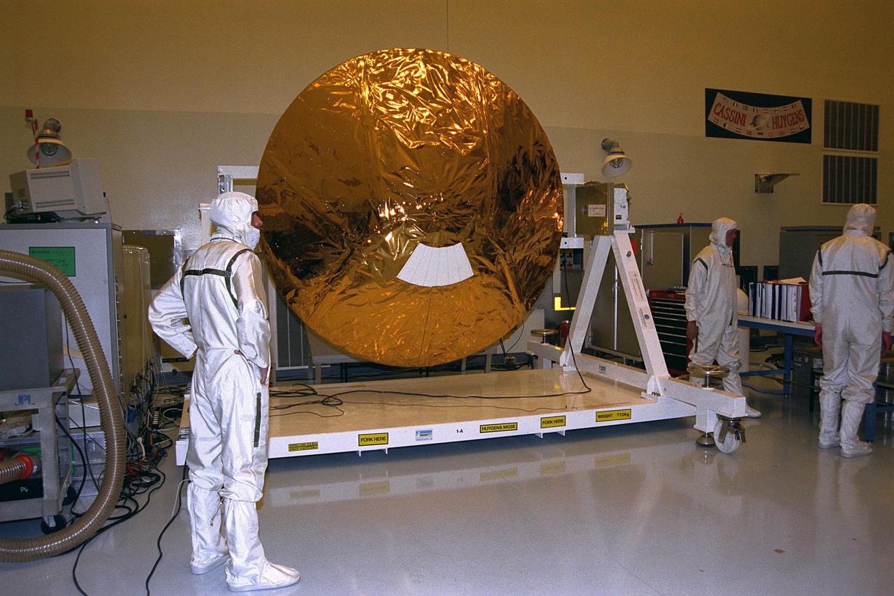 The Huygens probe is installed into the Cassini orbiter in the Payload Hazardous Servicing Facility (PHSF)