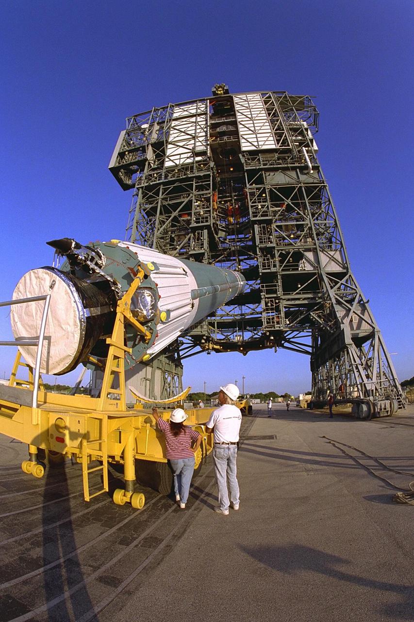 The first stage of the Delta II rocket which will to be used to launch the Advanced Composition Explorer (ACE) spacecraft is erected at Launch Complex 17A at Cape Canaveral Air Station. Scheduled for launch on Aug. 25, ACE will study low-energy particles of solar origin and high-energy galactic particles. The ACE observatory will be placed into an orbit almost a million miles (1.5 million kilometers) away from the Earth, about 1/100 the distance from the Earth to the Sun