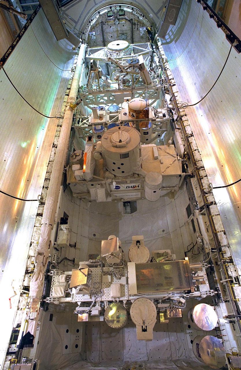 KENNEDY SPACE CENTER, FLA. -- The final tasks to prepare the Cryogenic Infrared Spectrometers and Telescopes for the Atmosphere-Shuttle Pallet Satellite-2 (CRISTA-SPAS-2) payload for the STS-85 mission are completed aboard Discovery at Launch Complex 39A. The CRISTA is a system of three telescopes and four spectrometers to measure infrared radiation emitted by the Earth’s middle atmosphere. During the 11-day mission, the CRISTA-SPAS-2 free-flying satellite will be deployed from Discovery and retrieved later in the flight. Also onboard the satellite will be the Middle Atmosphere High Resolution Spectrograph Investigation (MAHRSI) to measure ultraviolet radiation emitted and scattered by the Earth’s atmosphere.