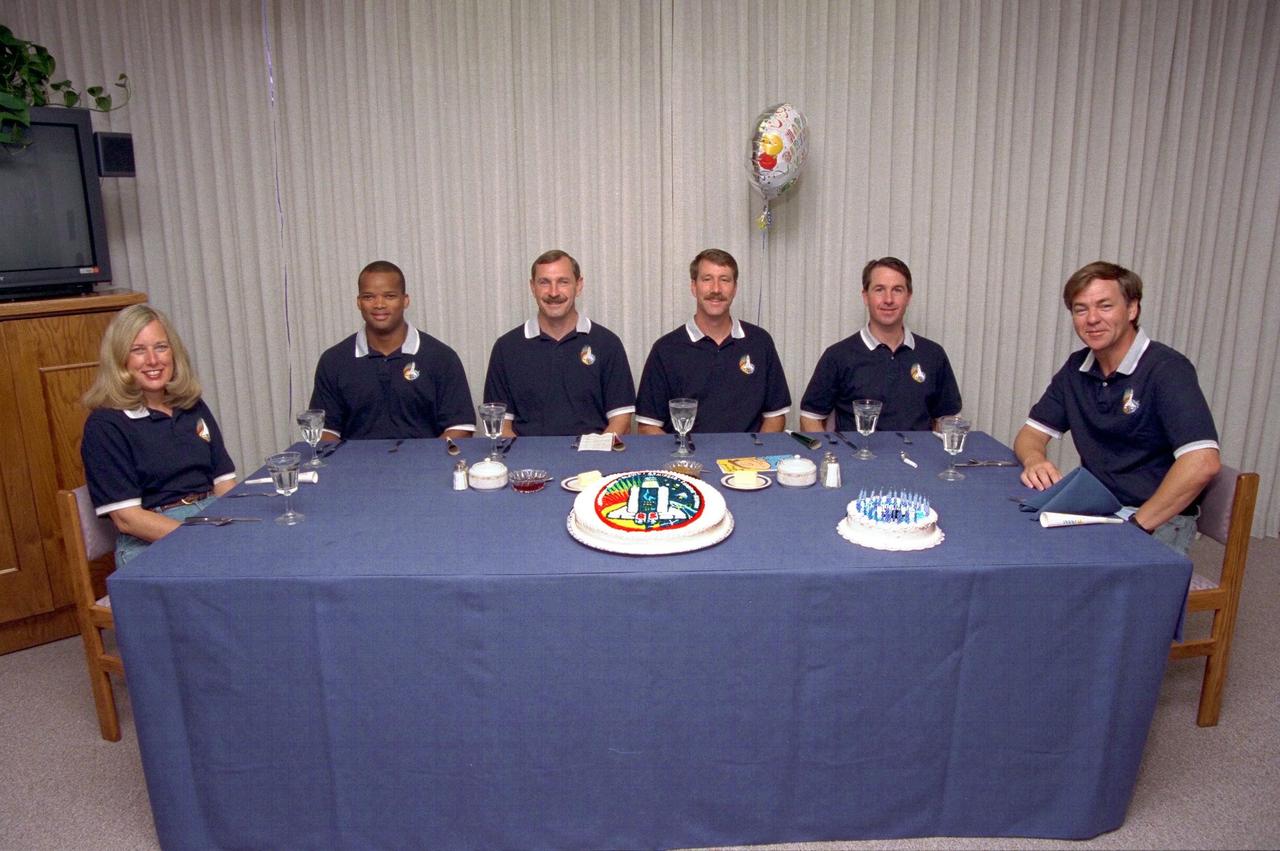 The STS-85 crew partakes in the traditional pre-liftoff breakfast in the Operations and Checkout (O&C) Building. They are (from left): Payload Commander N. Jan Davis; Mission Specialist Robert L. Curbeam, Jr.; Commander Curtis L. Brown, Jr.; Pilot Kent V. Rominger; Mission Specialist Stephen K. Robinson; Payload Specialist Bjarni V. Tryggvason; and The primary payload aboard the Space Shuttle orbiter Discovery is the Cryogenic Infrared Spectrometers and Telescopes for the Atmosphere-Shuttle Pallet Satellite-2 (CRISTA-SPAS-2). Other payloads on the 11-day mission include the Manipulator Flight Demonstration (MFD), and Technology Applications and Science-1 (TAS-1) and International Extreme Ultraviolet Hitchhiker-2 (IEH-2) experiments
