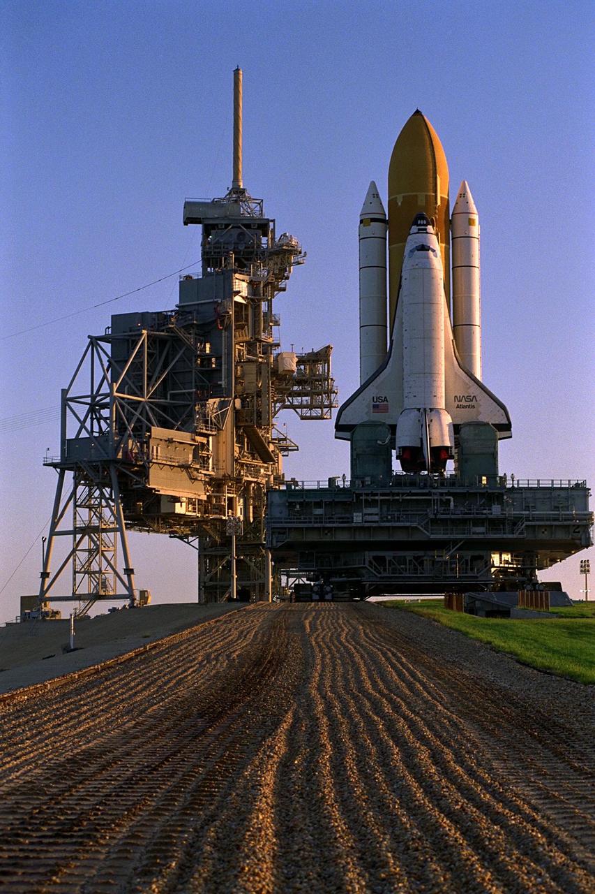 KENNEDY SPACE CENTER, Fla. -- Atop the crawler/transporter, the Space Shuttle orbiter Atlantis rolls out to Launch Complex 39A in preparation for mission STS-86, which is targeted for a September launch. STS-86 will be the seventh of nine planned dockings of the Space Shuttle orbiter with the Russian Space Station Mir