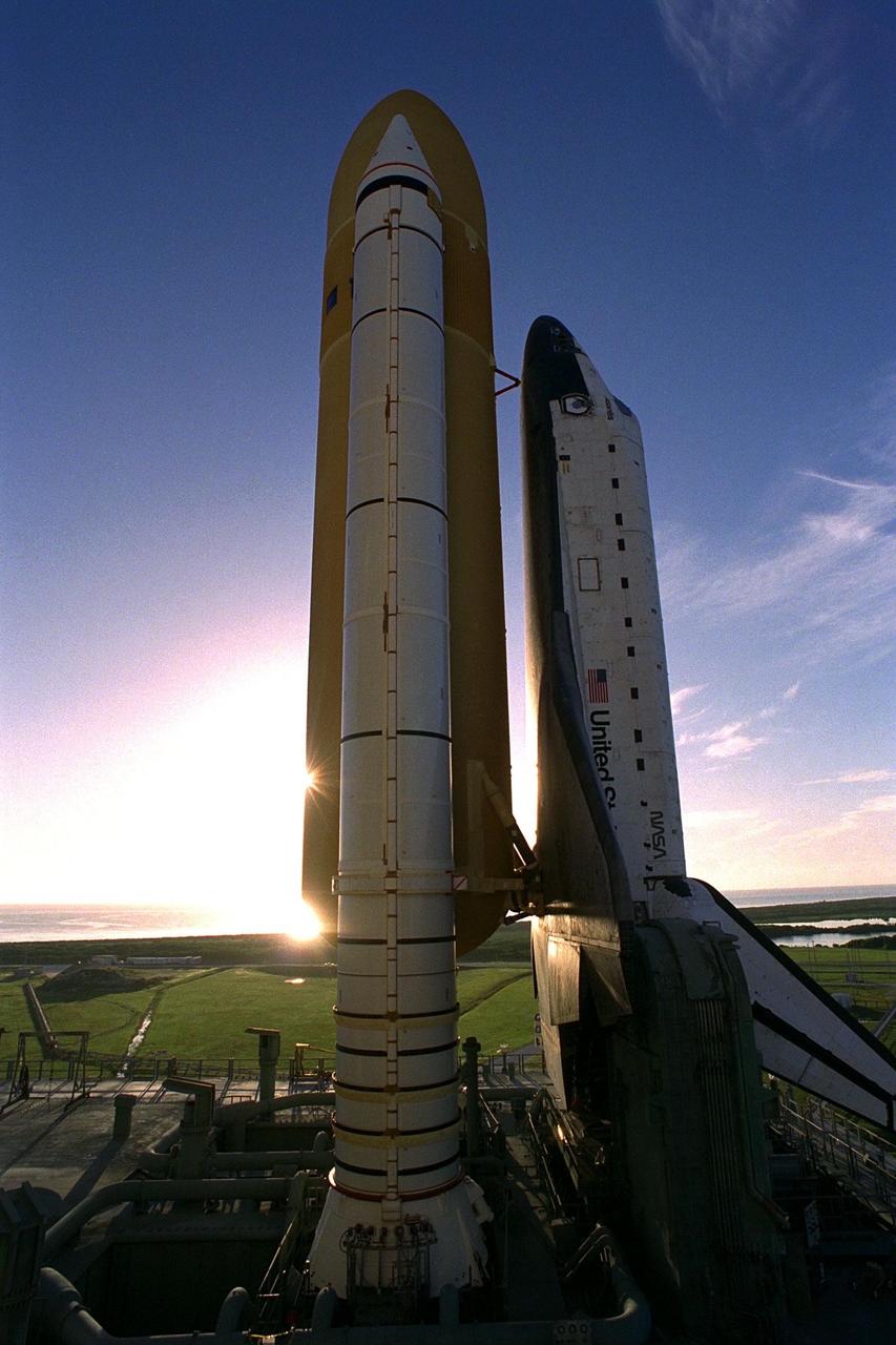 KENNEDY SPACE CENTER, Fla. -- Atop the crawler/transporter, the Space Shuttle orbiter Atlantis rolls out to Launch Complex 39A in preparation for mission STS-86, which is targeted for a September launch. STS-86 will be the seventh of nine planned dockings of the Space Shuttle orbiter with the Russian Space Station Mir