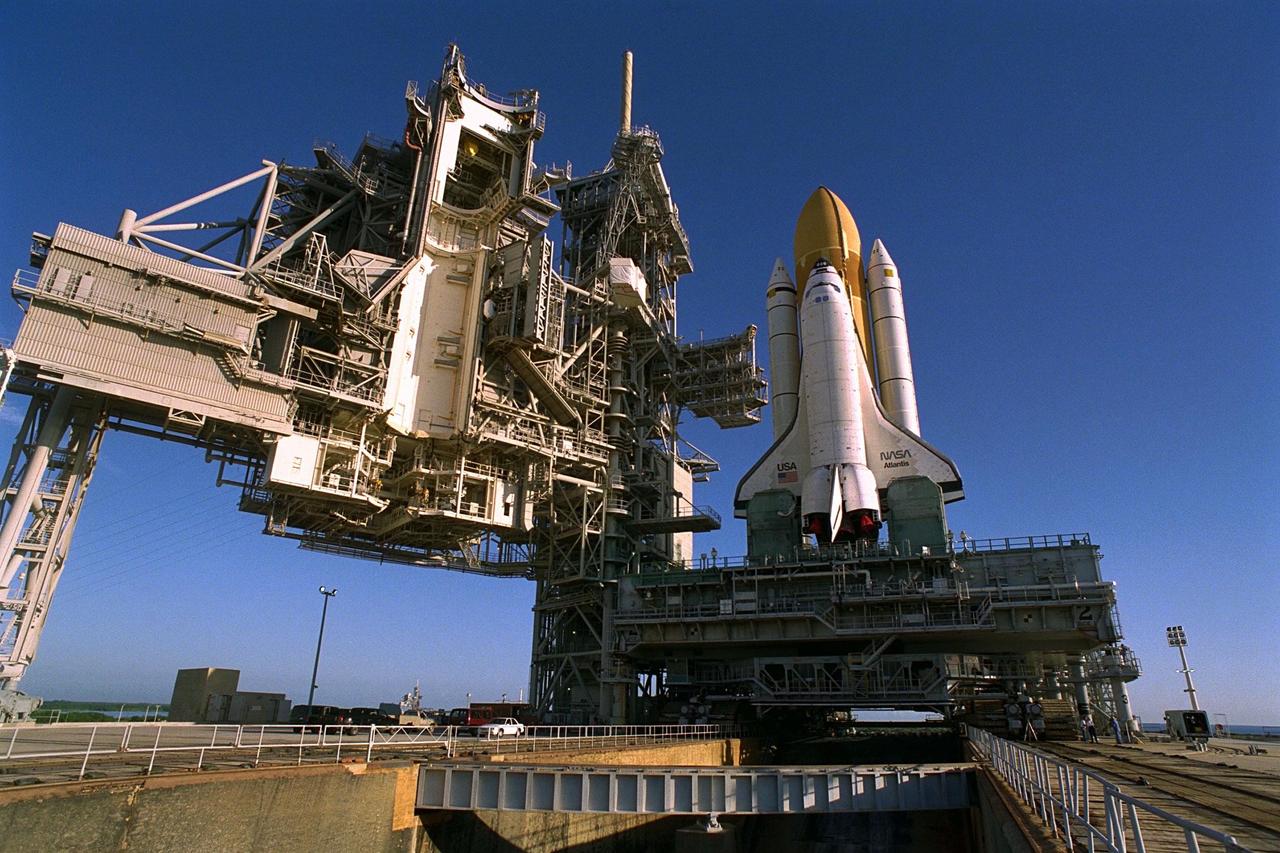 KENNEDY SPACE CENTER, Fla. -- Atop the crawler/transporter, the Space Shuttle orbiter Atlantis rolls out to Launch Complex 39A in preparation for mission STS-86, which is targeted for a September launch. STS-86 will be the seventh of nine planned dockings of the Space Shuttle orbiter with the Russian Space Station Mir