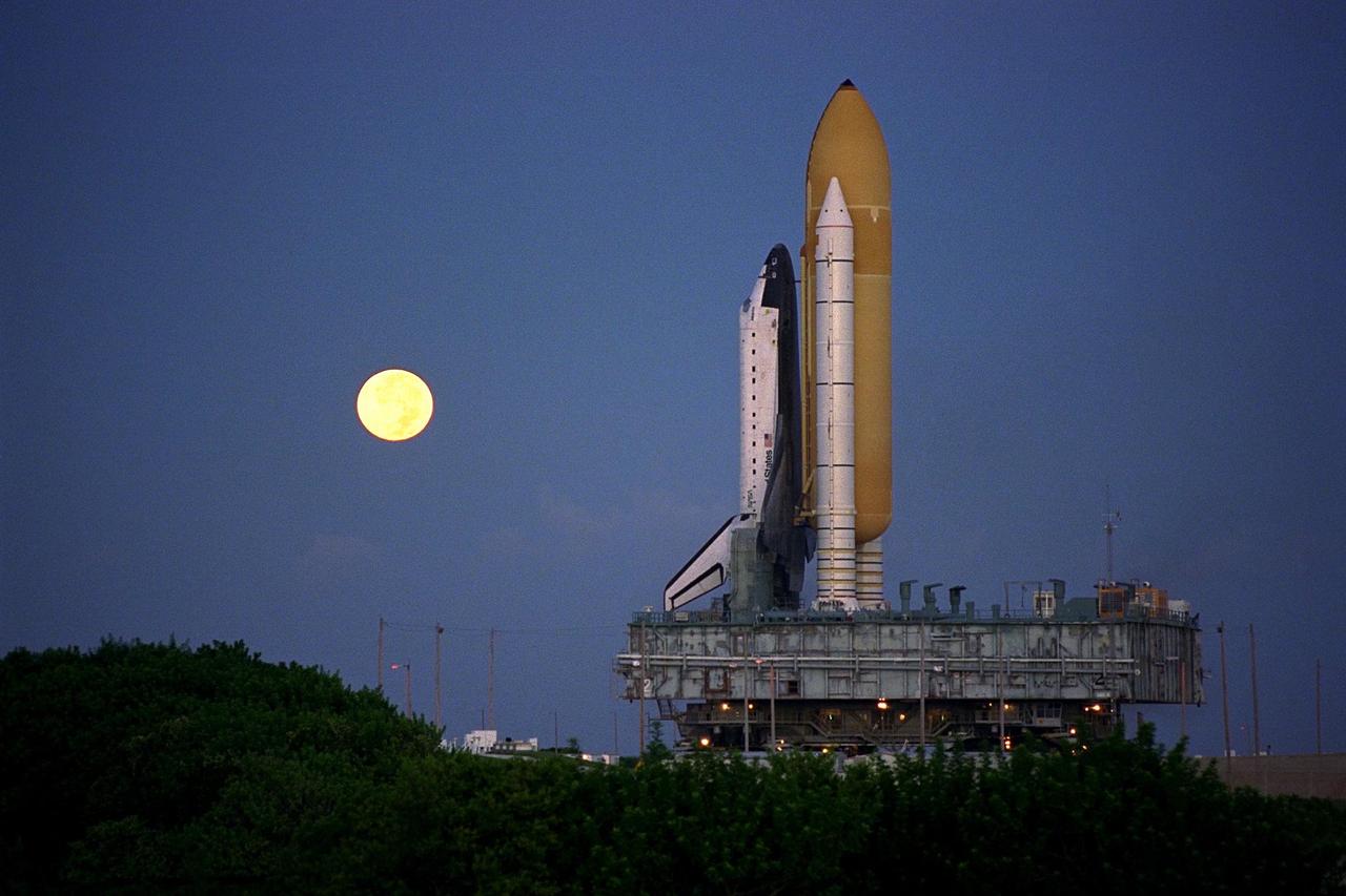 KENNEDY SPACE CENTER, Fla. -- Atop the crawler/transporter, the Space Shuttle orbiter Atlantis rolls out to Launch Complex 39A in preparation for mission STS-86, which is targeted for a September launch. STS-86 will be the seventh of nine planned dockings of the Space Shuttle orbiter with the Russian Space Station Mir