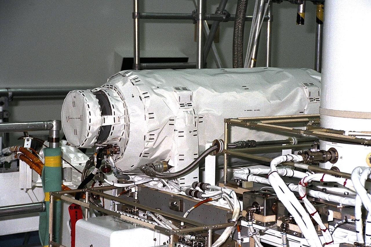 United States Microgravity Payload-4 (USMP-4) experiments are prepared to be flown on Space Shuttle mission STS-87 in the Space Station Processing Facility at Kennedy Space Center (KSC). This horizontal tube is known as MEPHISTO, the French acronym for a cooperative American-French investigation of the fundamentals of crystal growth. This experiment, designed for the study of solidification (or freezing) during the growth cycle of liquid materials used for semiconductor crystals, aims to aid in the development of techniques for growing higher quality crystals on Earth. All STS-87 experiments are scheduled for launch on Nov. 19 from KSC