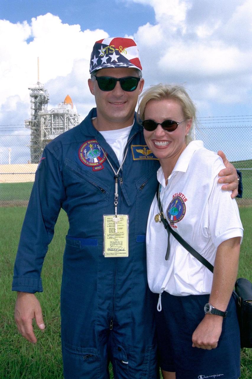 STS-86 Mission Specialist David A. Wolf and friend Tammy Kruse greet family members, friends and other well-wishers during a brief visit to Launch Pad 39A on Sept. 24, the day before the Space Shuttle Atlantis is scheduled to lift off with its crew of seven. STS-86 is slated to be the seventh docking of the Space Shuttle with the Russian Space Station Mir. Wolf will be making his second spaceflight. After the docking, Wolf is scheduled to become a member of the Mir 24 crew, replacing U.S. astronaut C. Michael Foale. Wolf would remain on the Mir for about four months. Foale, who has been on the Mir since the STS-84 mission in mid-May, will return to Earth with the remaining six members of the STS-86 crew at the end of the planned 10-day flight